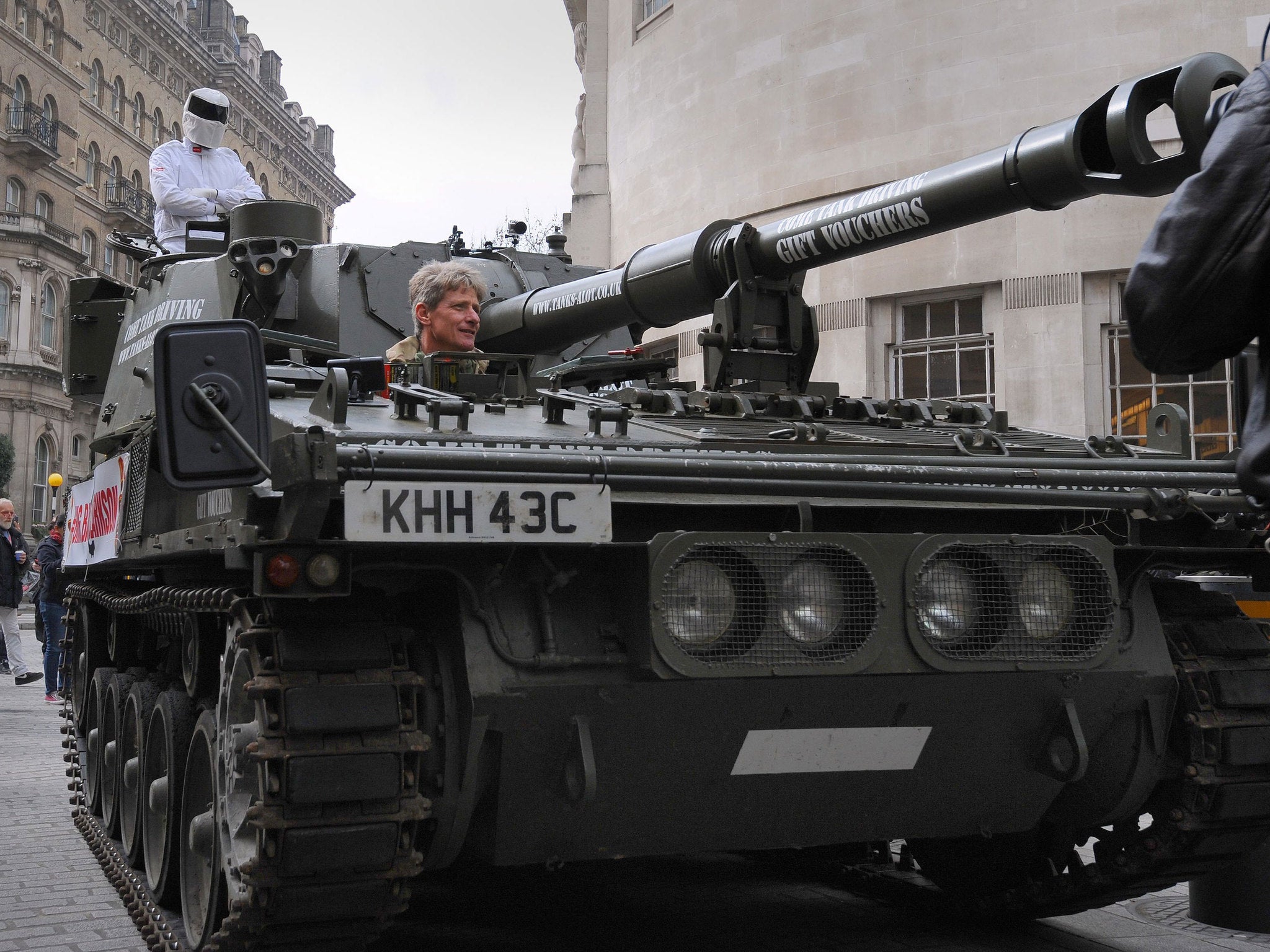 Police forced to issue alert as Stig drives through London to support Jeremy Clarkson