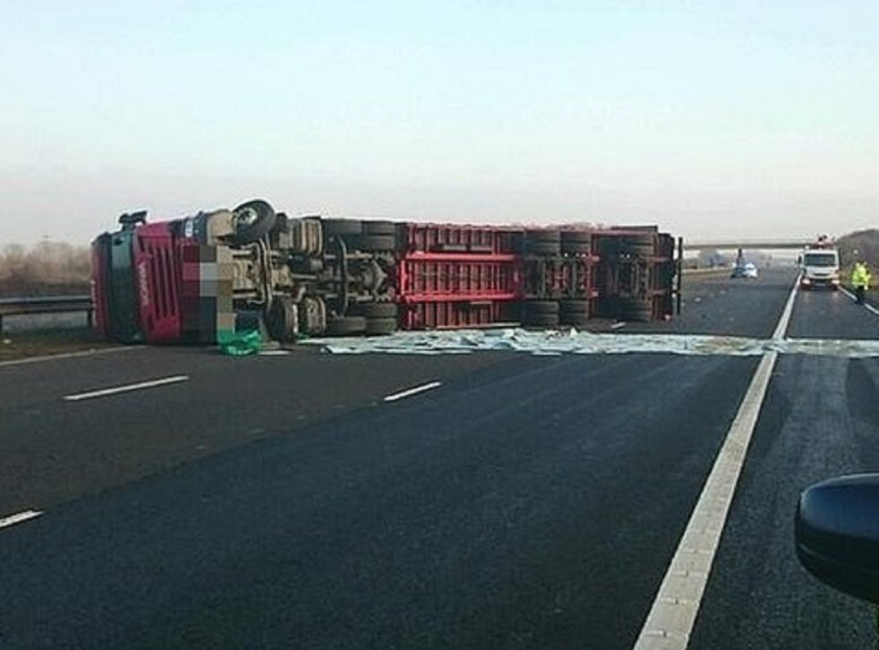 m5 crash overturned lorry spills hundreds of litres of fuel on motorway causing severe delays the independent the independent m5 crash overturned lorry spills