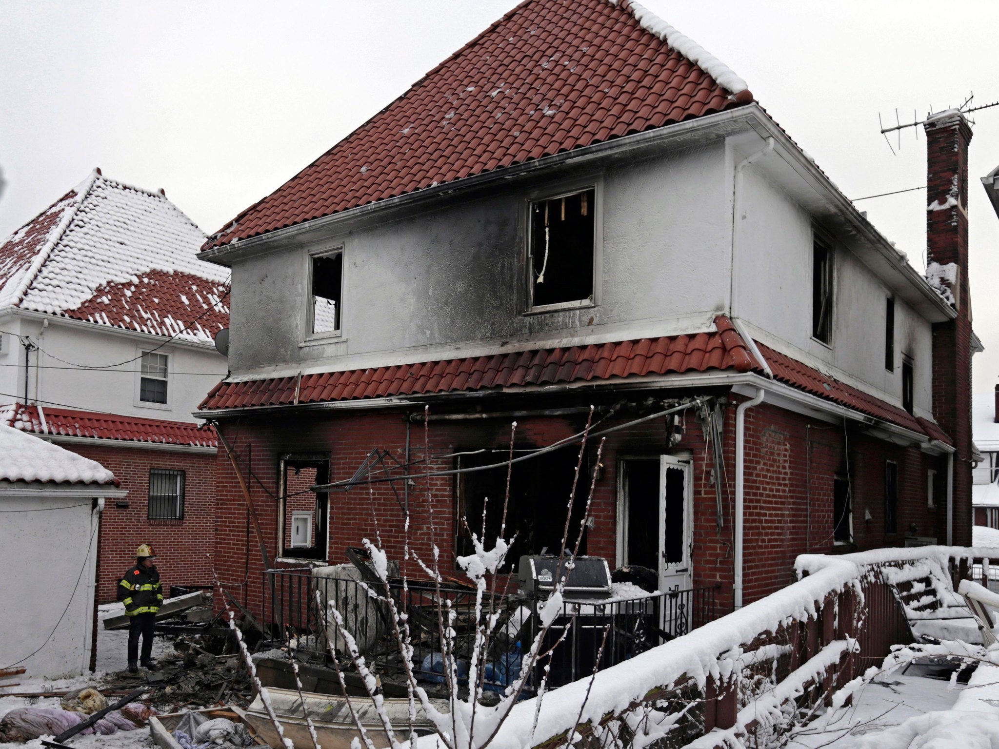 The fire gutted the two-storey house in Brooklyn
