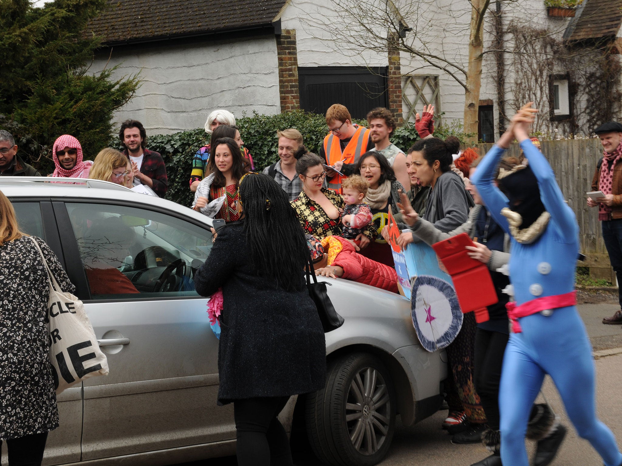 Some protesters jumped on to the bonnet of Nigel Farage's car