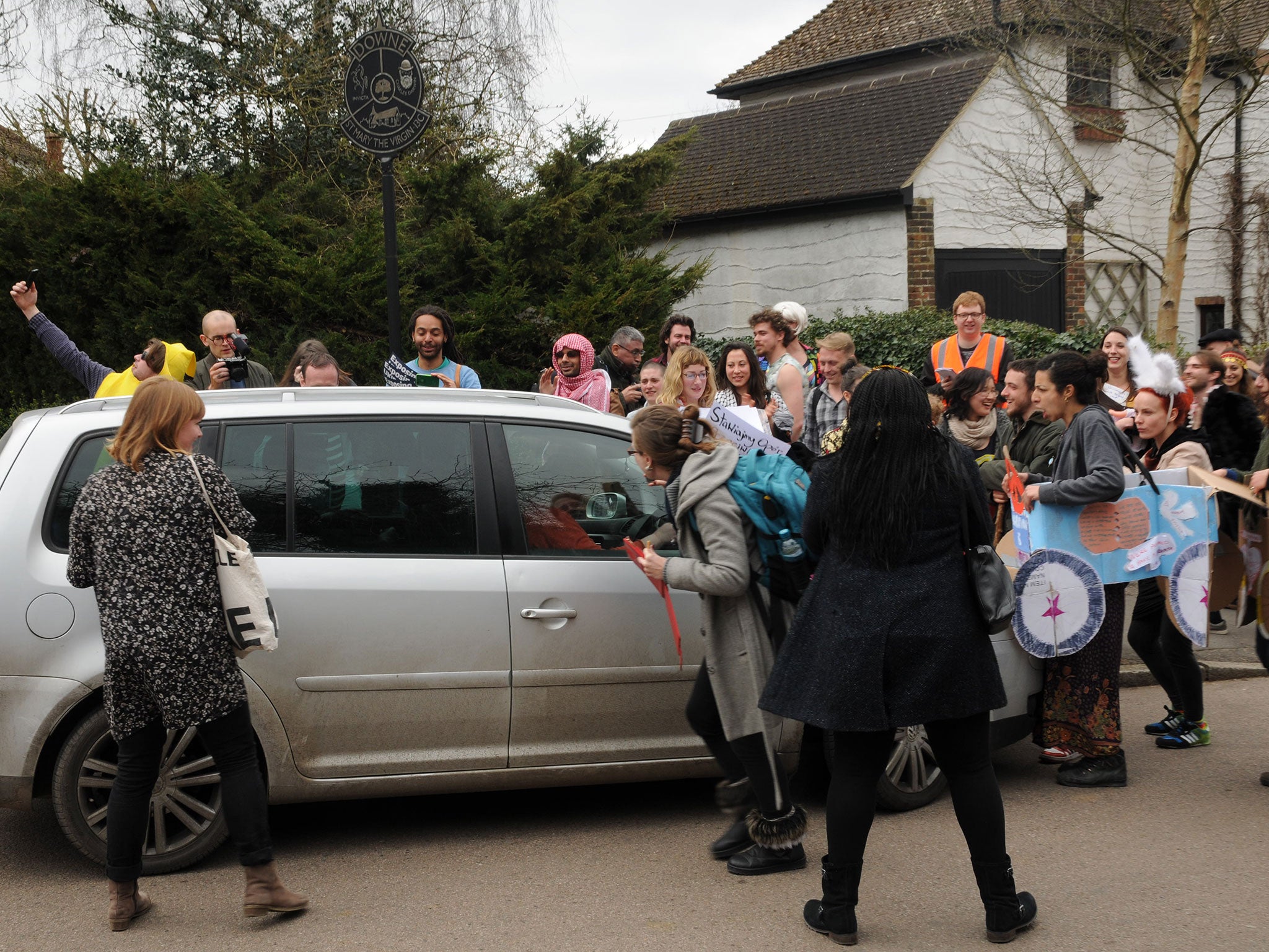 Nigel Farage was mobbed as he ran out to his car