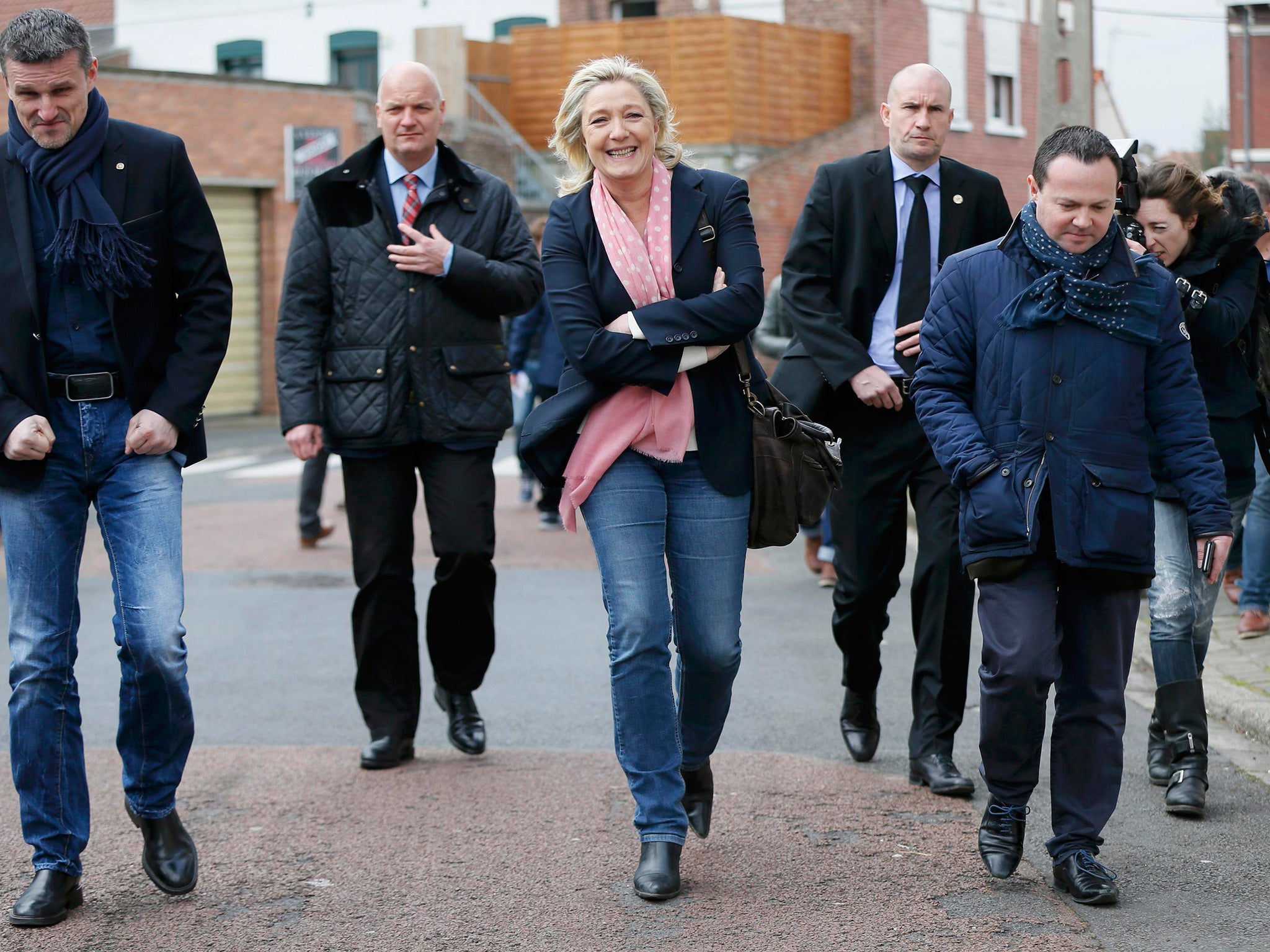 Marine Le Pen, leader of the far-right Front National party, leaves a polling station after voting in her home town of Henin-Beaumont, in the Pas-de-Calais area of northern France