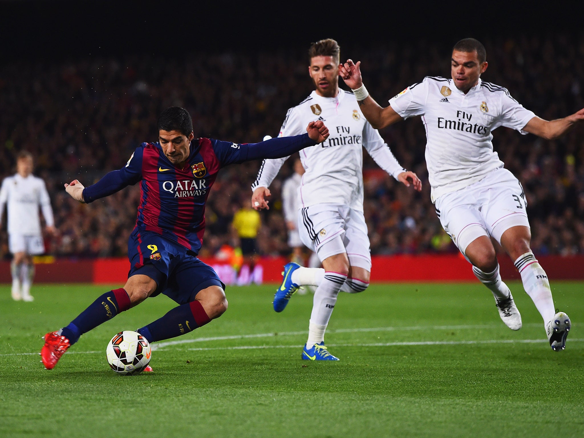 Suarez beats Pepe and Ramos to tuck the ball home for the winner