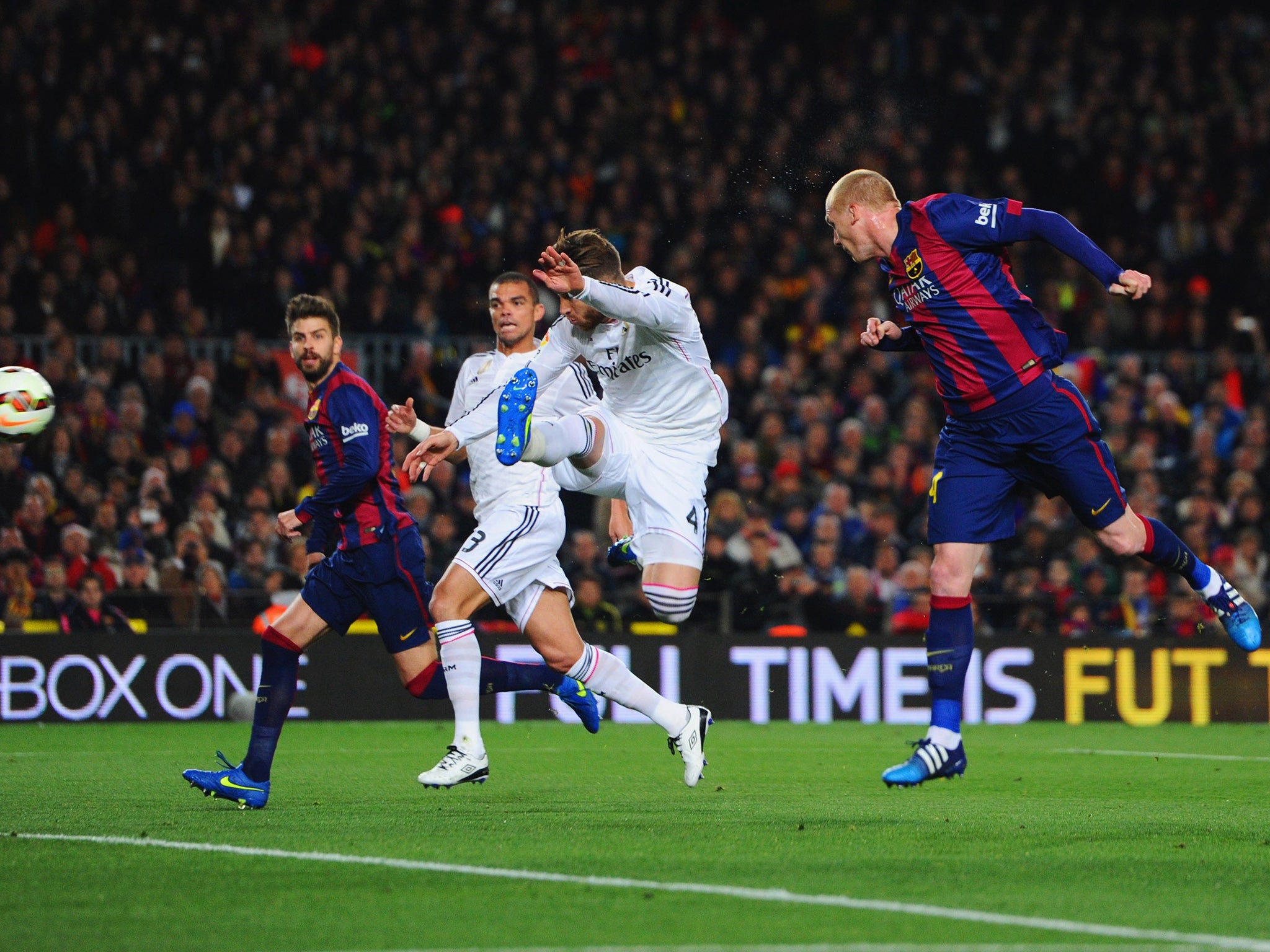 Jeremy Mathieu heads Barcelona into the lead