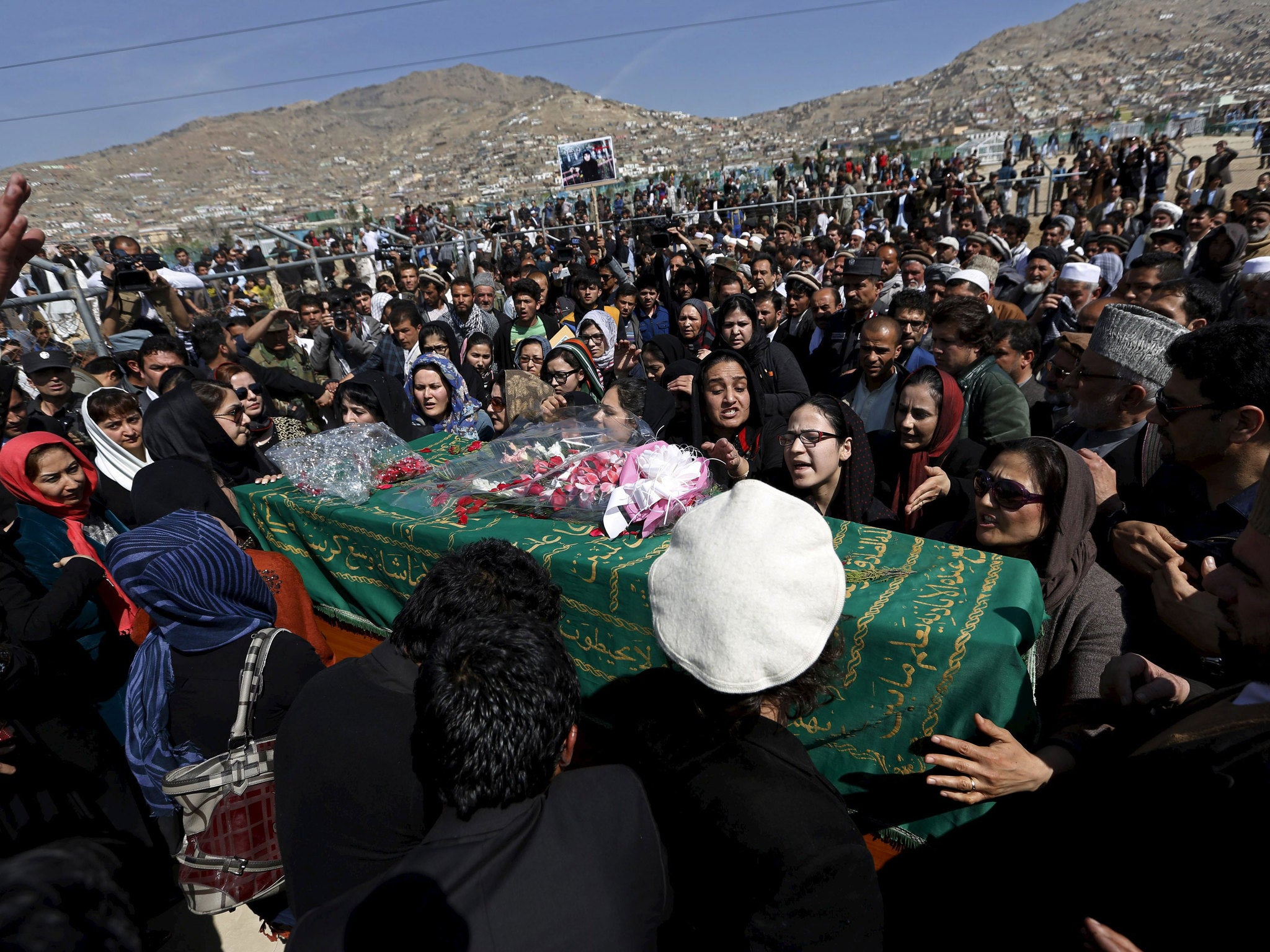 Hundreds attended the funeral, which was broadcast live