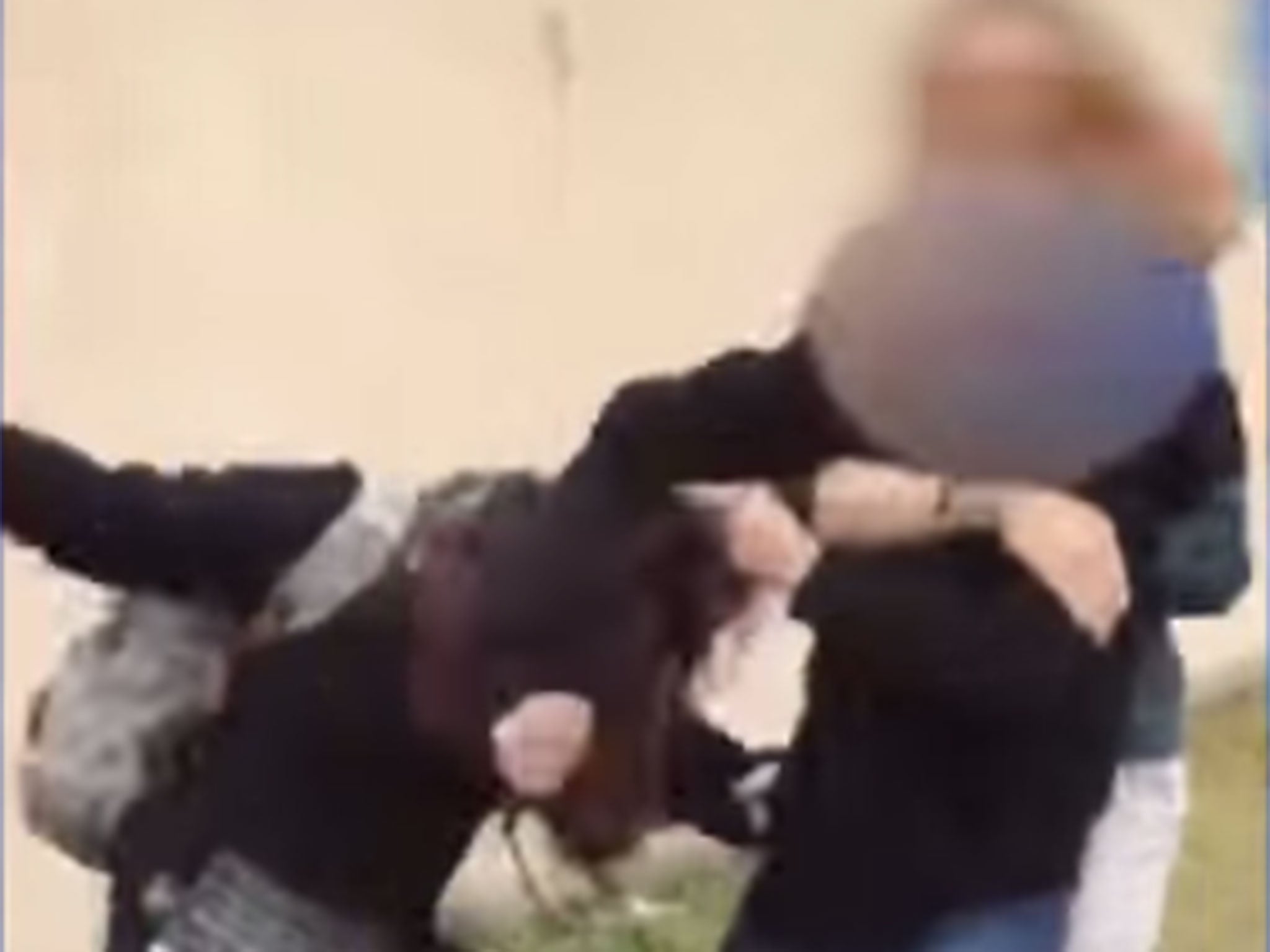 The girl's were filmed fighting outside of their school in New Mexico