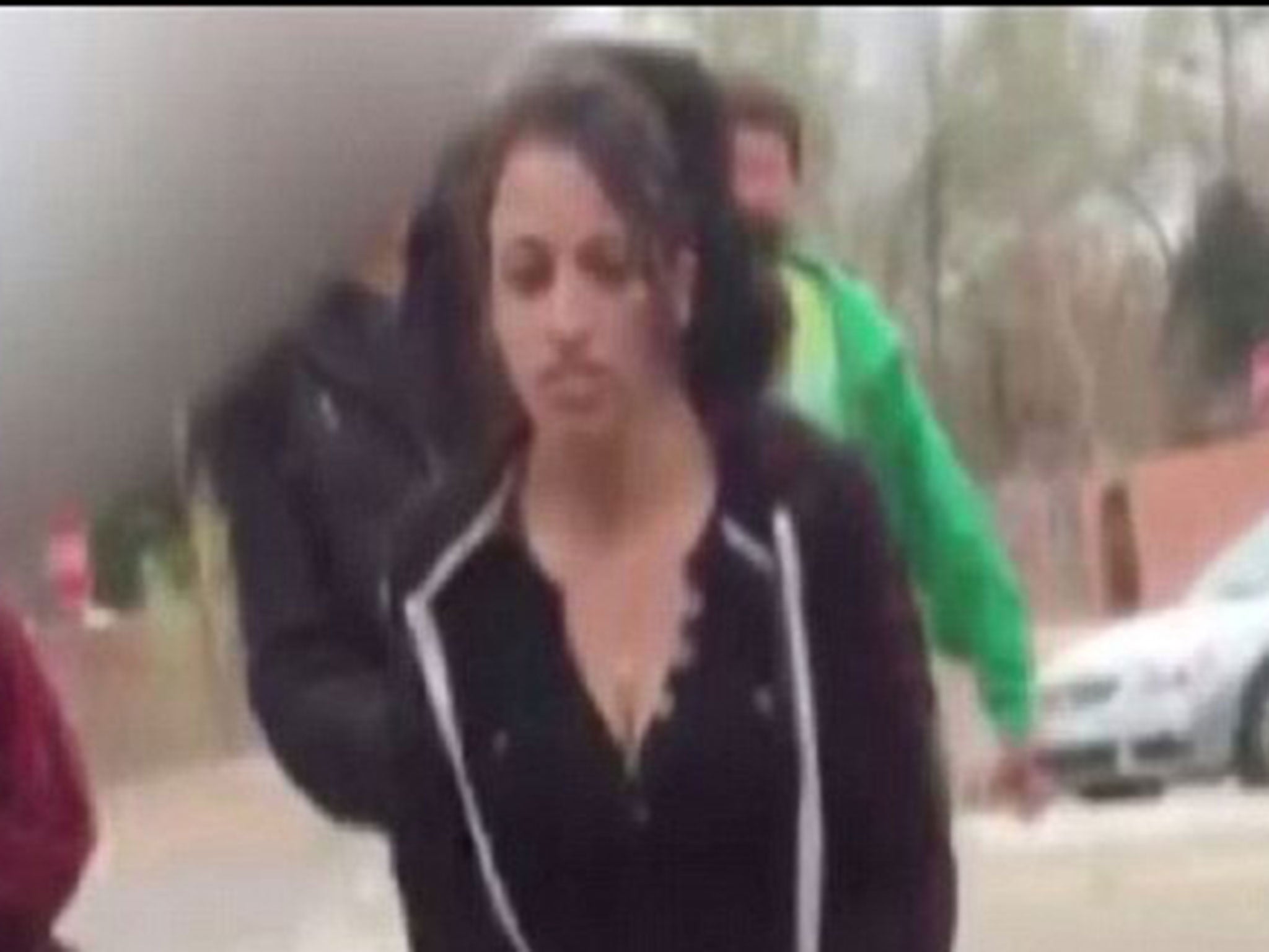 Nicole Morlan was filmed cheering as her daughter fought outside of the school (KOAT7)
