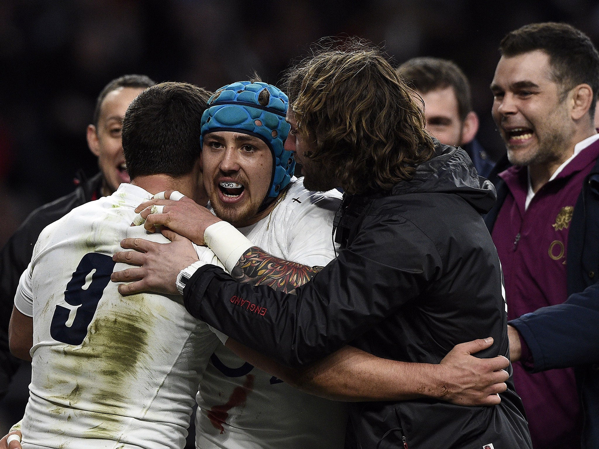 Ben Youngs celebrates scoring a try with his England team-mates