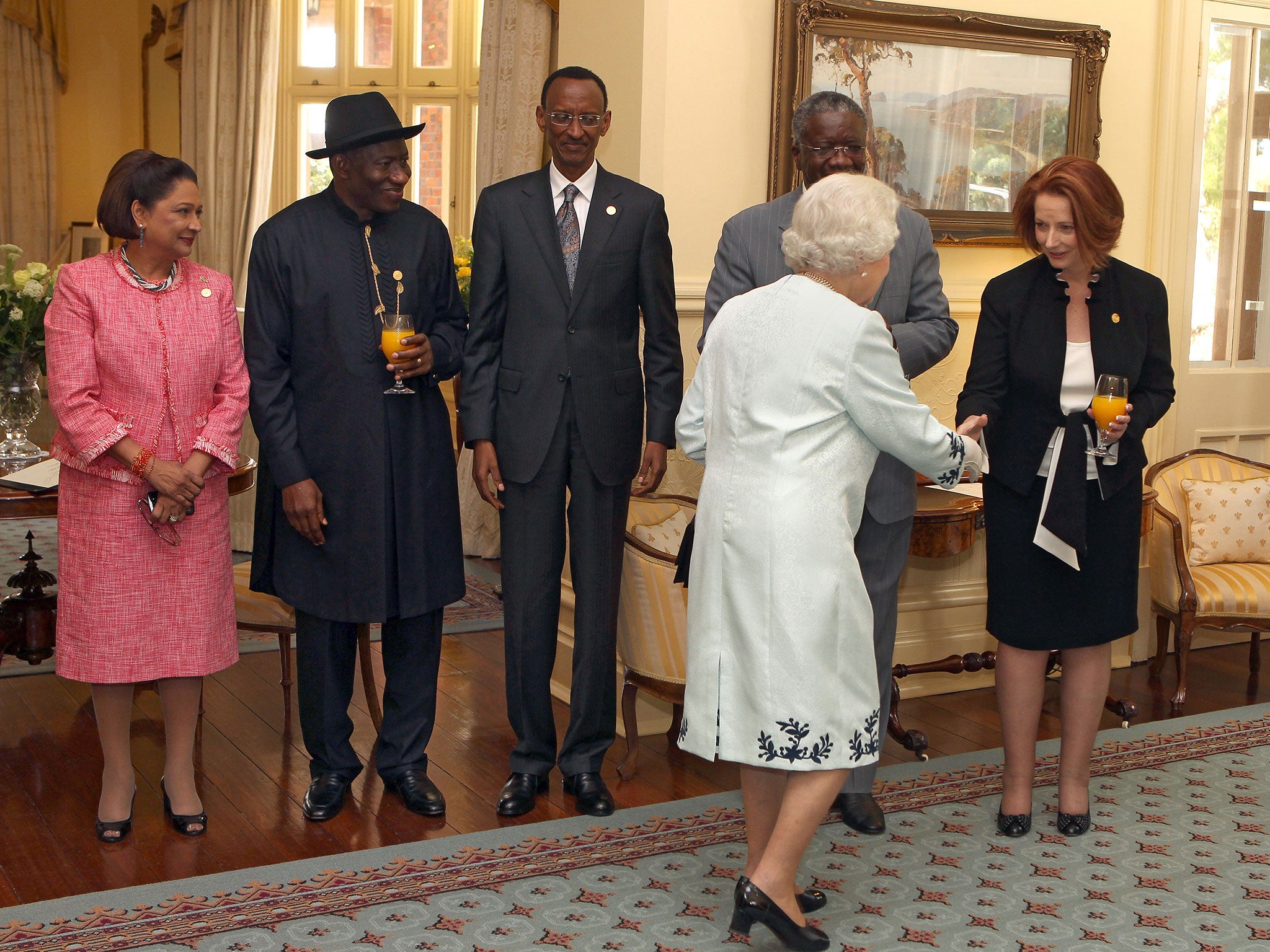 Queen Elizabeth II with Barbados Prime Minister Freundel Jerome Stuart (2nd R)