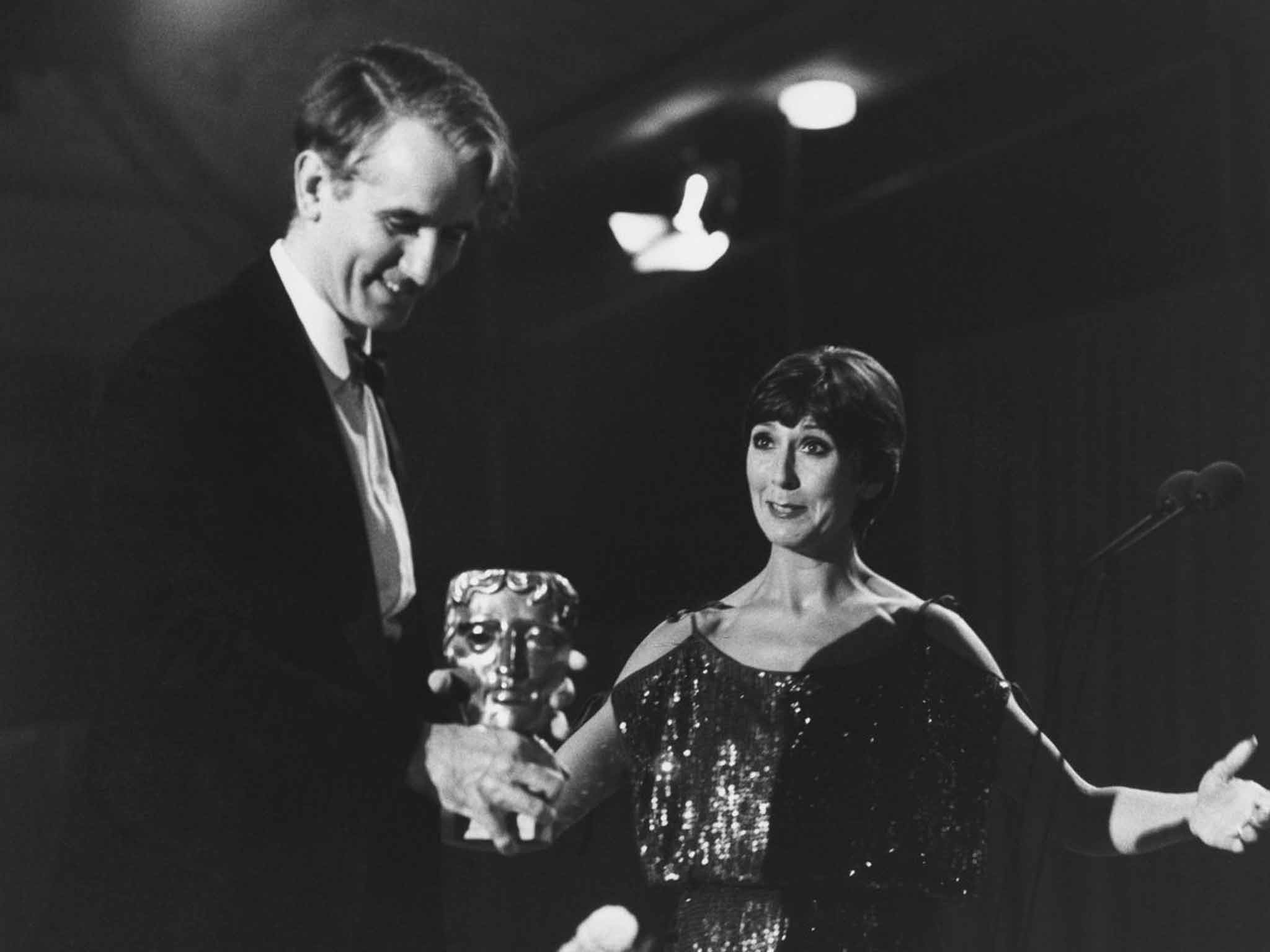 Gowers receives his 1983 Bafta award from Anita Harris