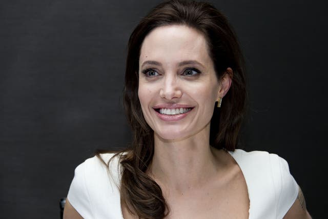 The father Tim Alexander said the twins did not realise Jolie was a celebrity at the time