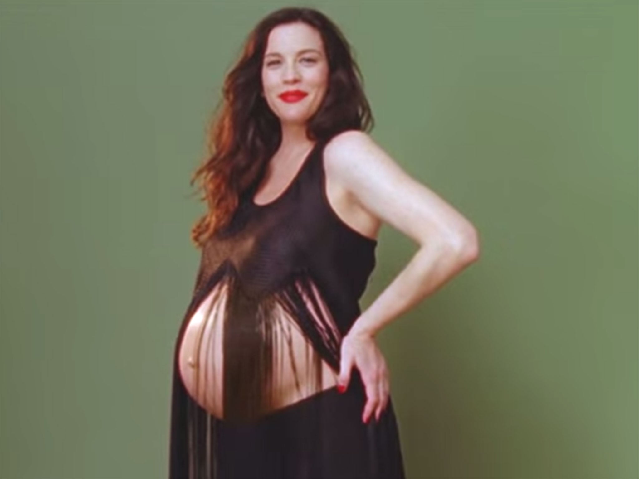 Pregnant Liv Tyler shows off her bare baby bump in fashion film