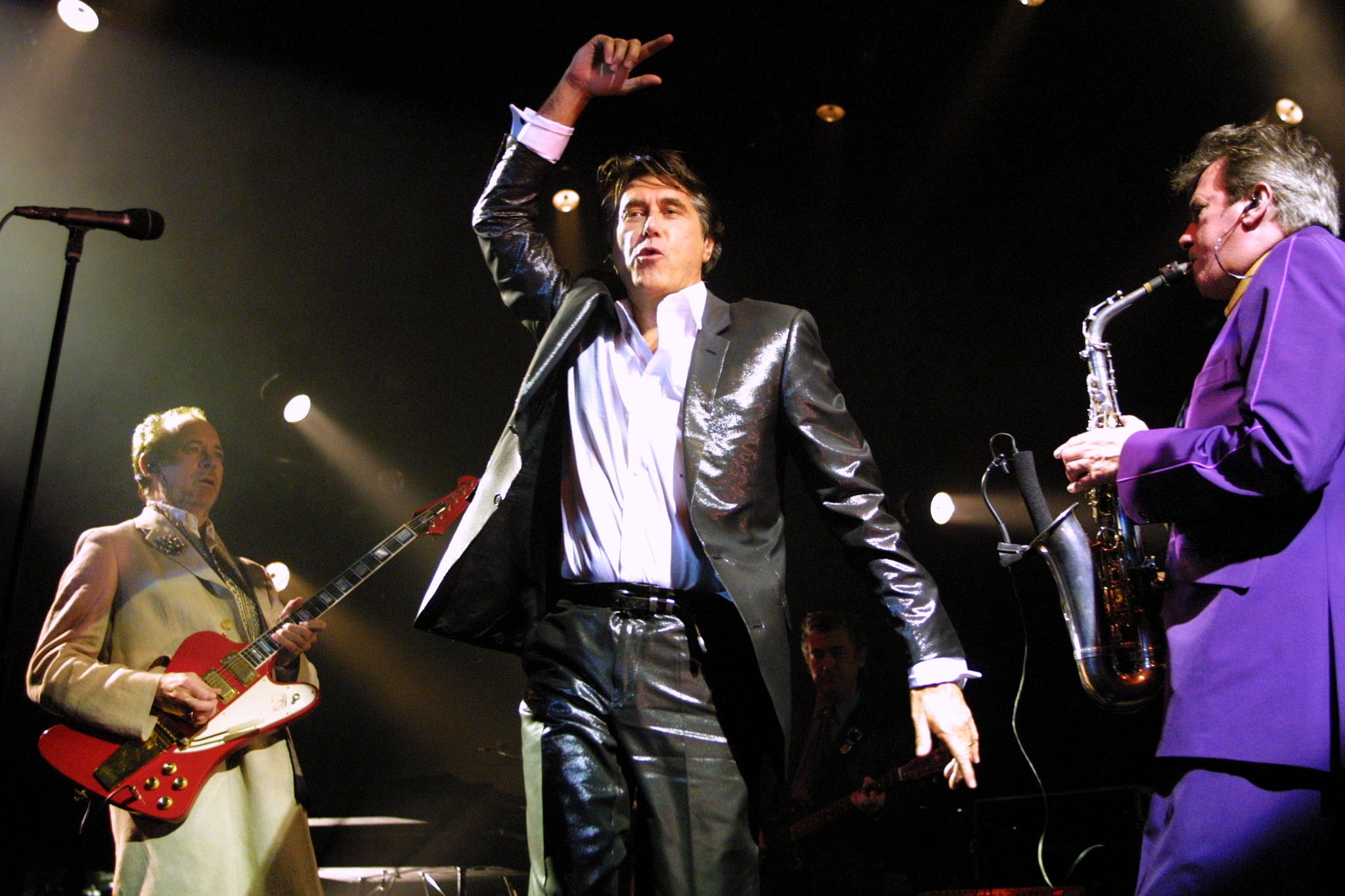 Phil Manzanera, Bryan Ferry, and Andy Mackay perform at The Theater at Madison Square Garden in 2001