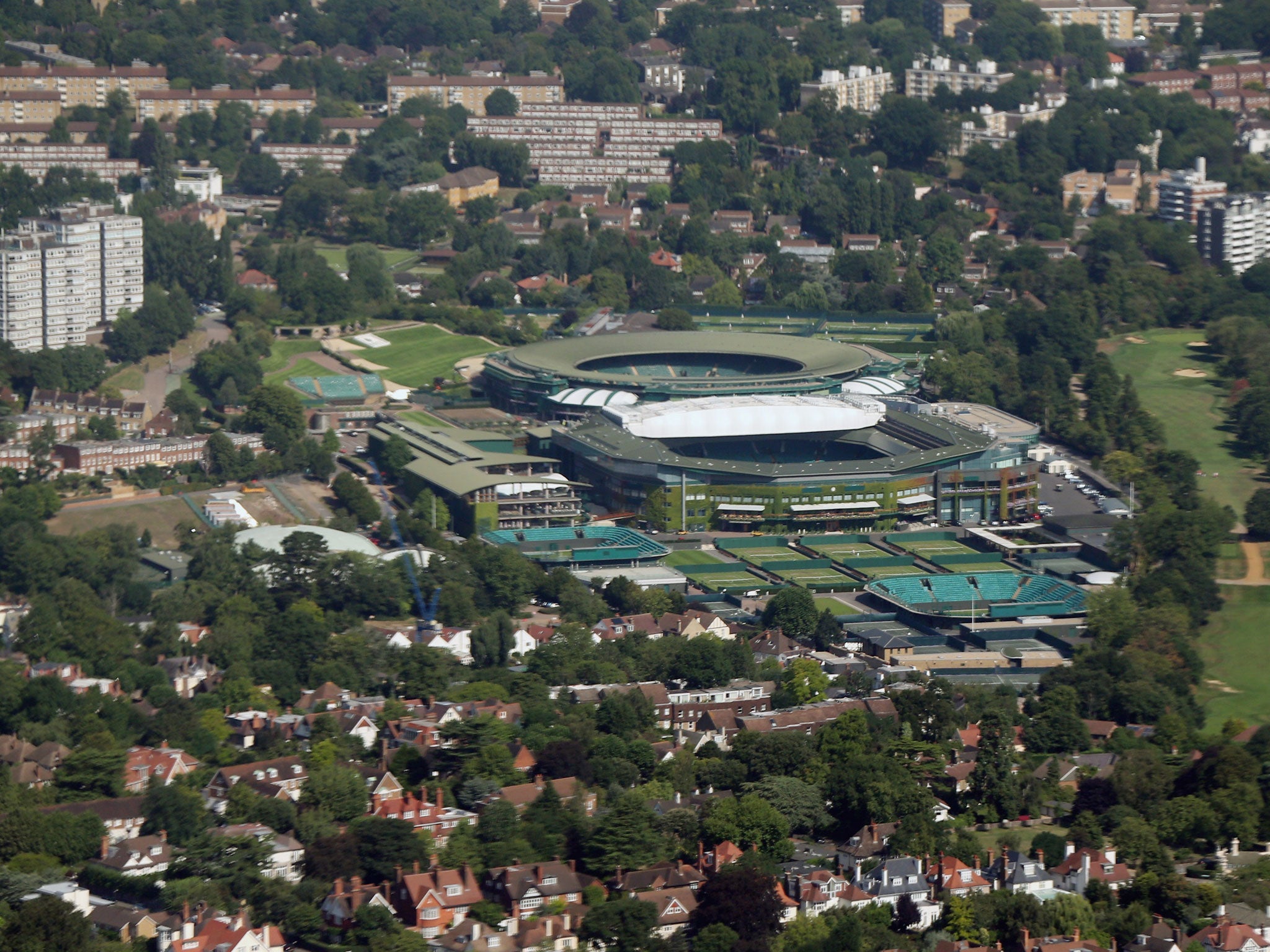 A view of the All England Lawn Tennis and Croquet Club (Wimbledon) from the Catalina, a 70 year old aircraft, during the first leg of its 'Circuit of Britain Flight', departing from the Imperial War Museum Duxford on August 21, 2013 in London, England. T