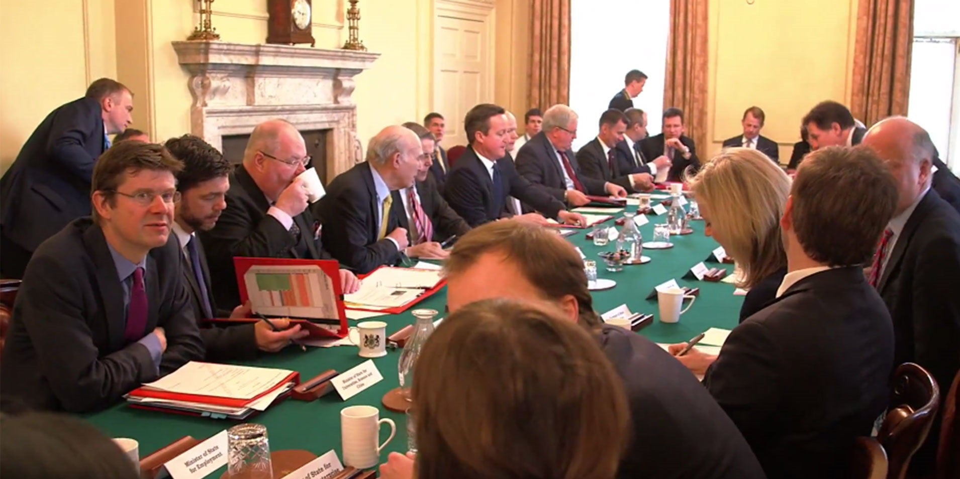 Ministers sit at the Cabinet table in No 10 (The Sun)