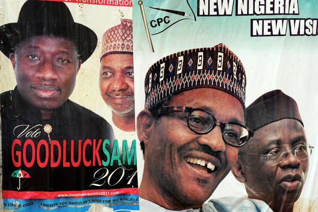Posters representing the candidates in 2011, when General Buhari failed on his second bid to become a democratically elected president - Saturday's election will be his third