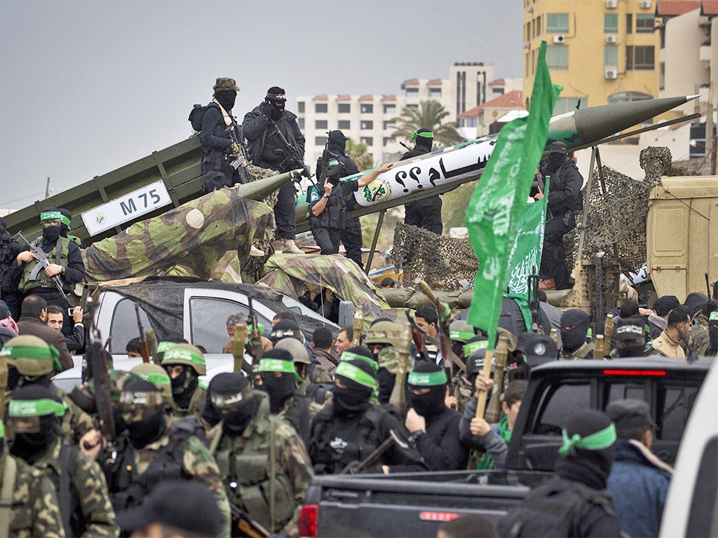 Palestinian militants of the Ezzedine al-Qassam Brigades, Hamas' armed wing, pictured during a parade in Gaza City last December