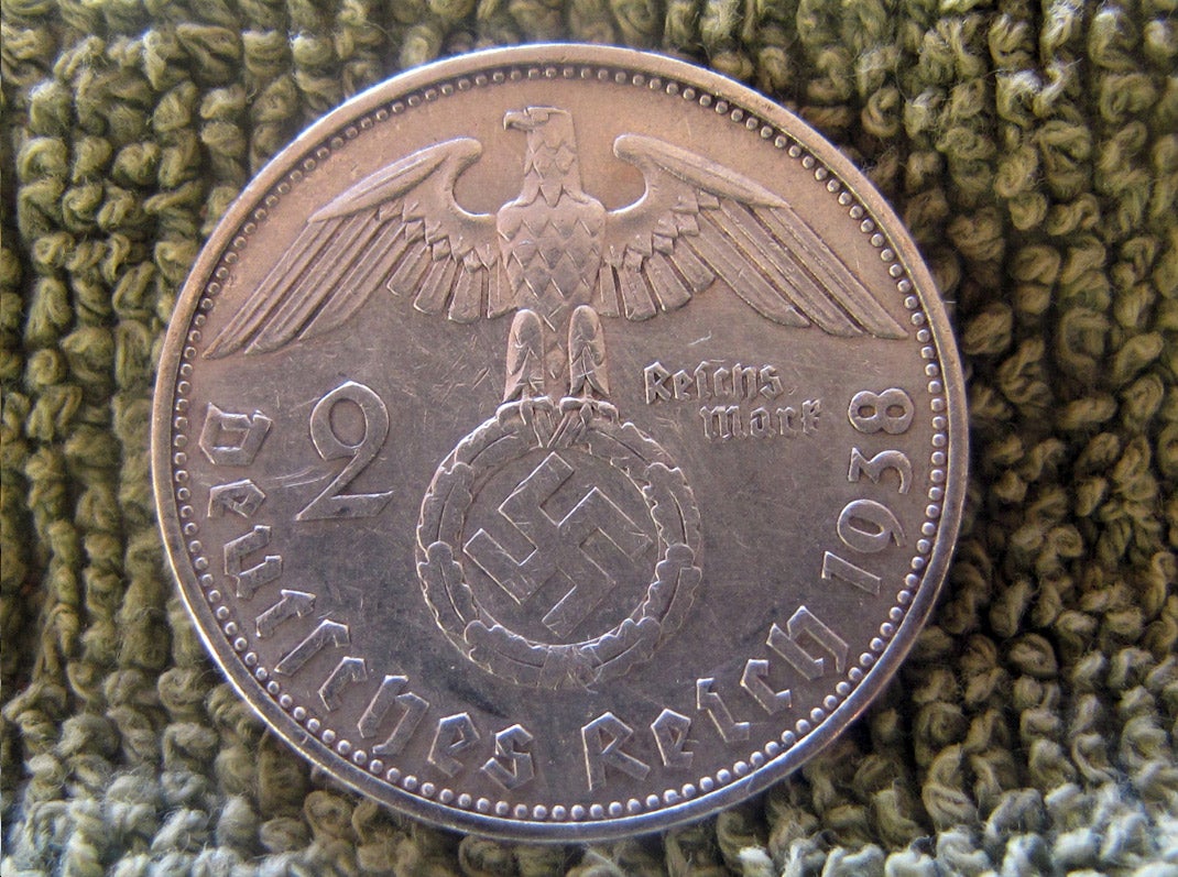 A German coin found in the remains of a house built inside Teyu Cuare