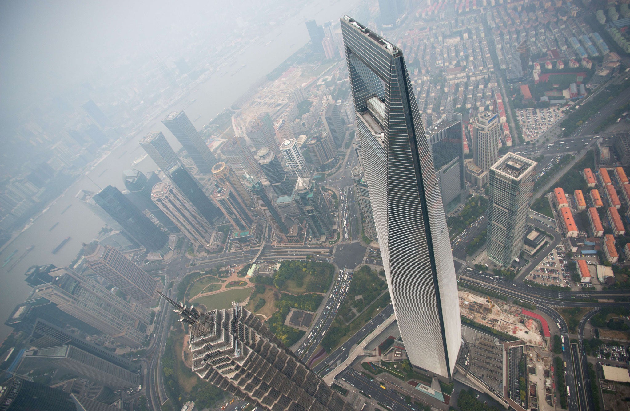 The high-rise changes to Shanghai's Pudong District between 1987 and 2013 have made the city unrecognisable (Getty)