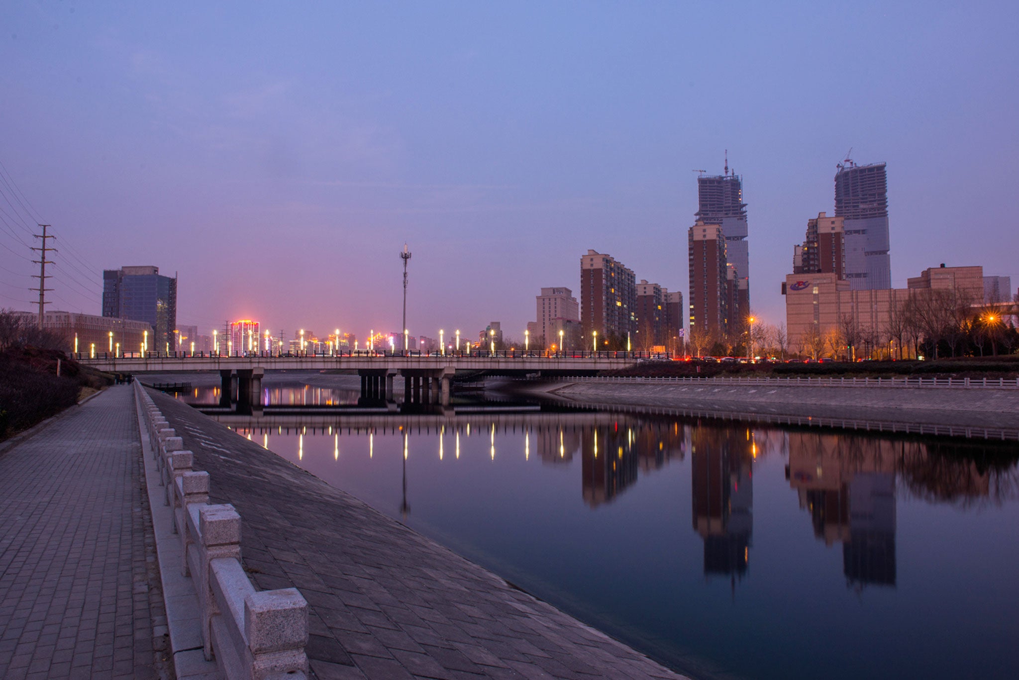 Even relatively minor cities such as Zhengzhou (pictured) are more populous than Los Angeles or Chicago (Getty)