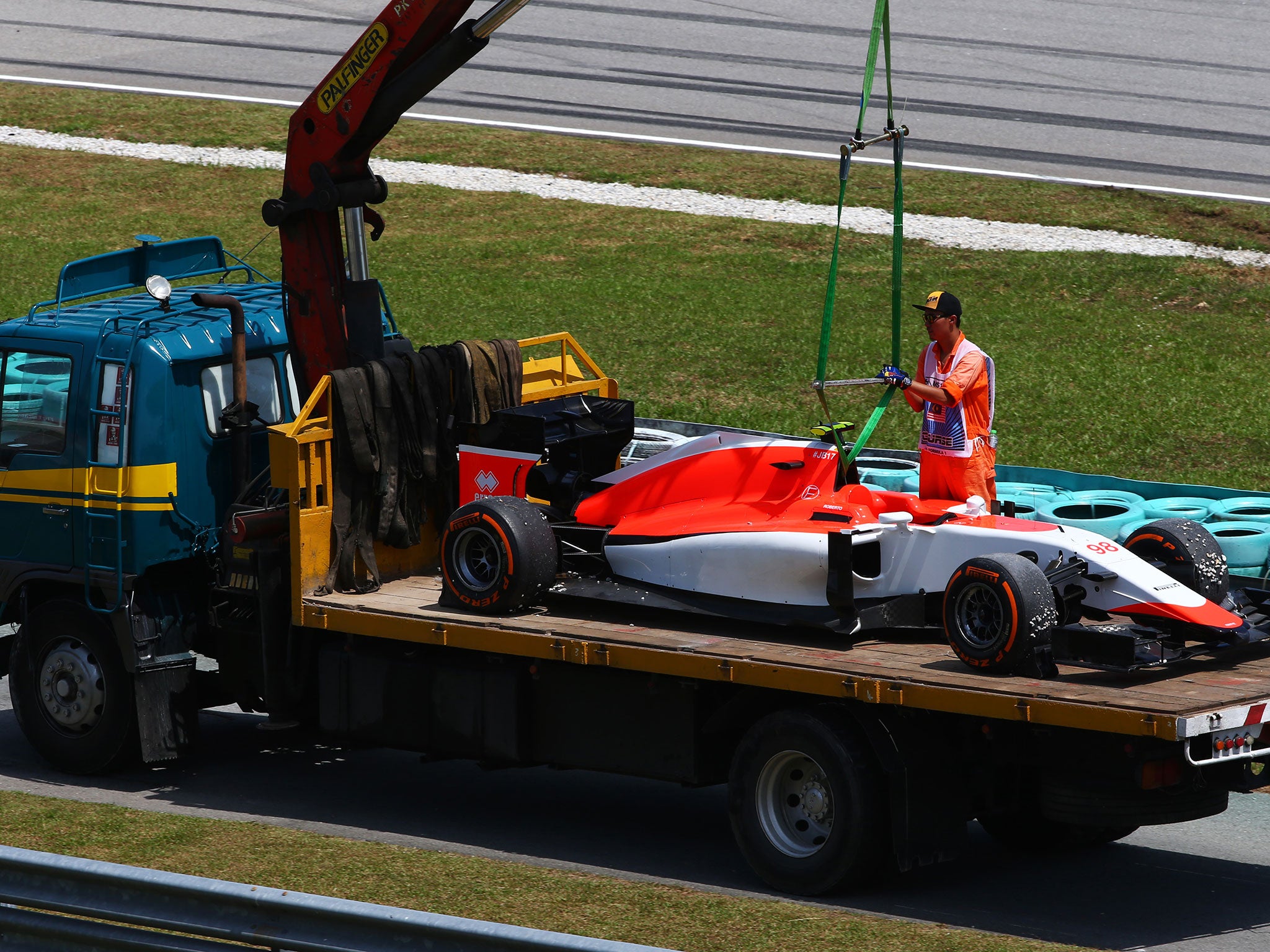 Roberto Merhi's first ever run in the Manor Marussia ended in the gravel trap