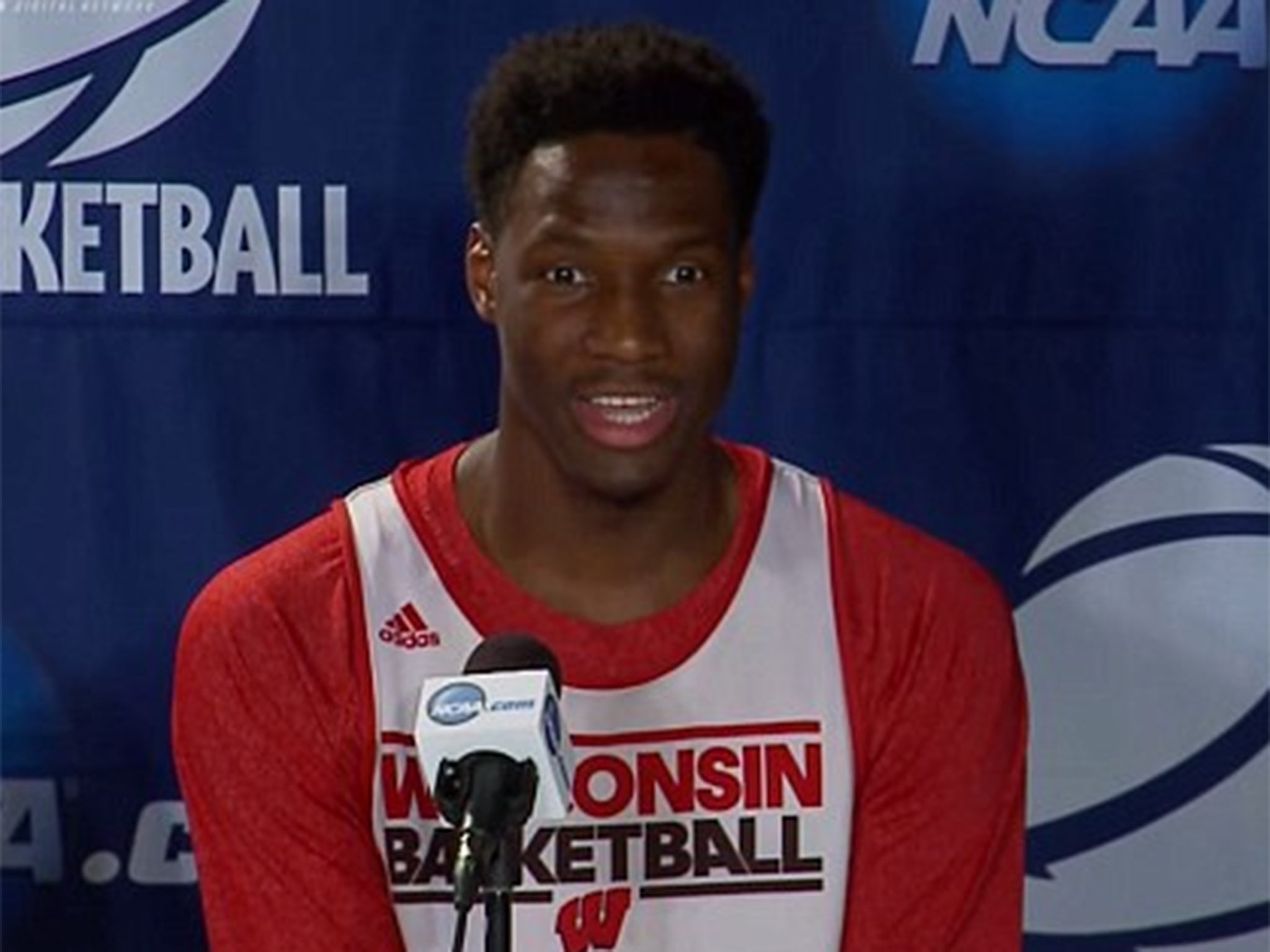 Basketball player Nigel Hayes after realising his error