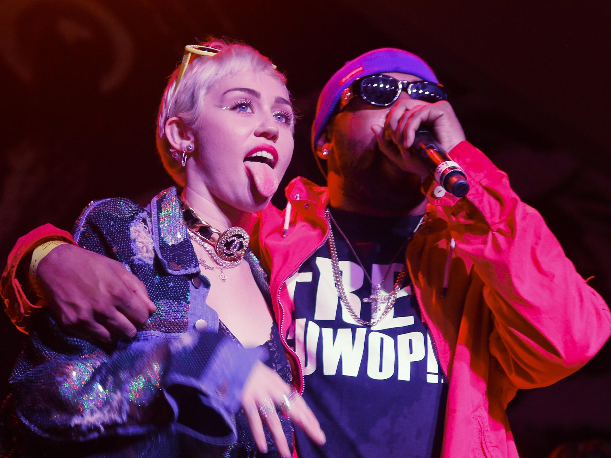 Party in the USA: Miley Cyrus and Mike WiLL-Made It made a supposedly surprise appearance on a Converse stage