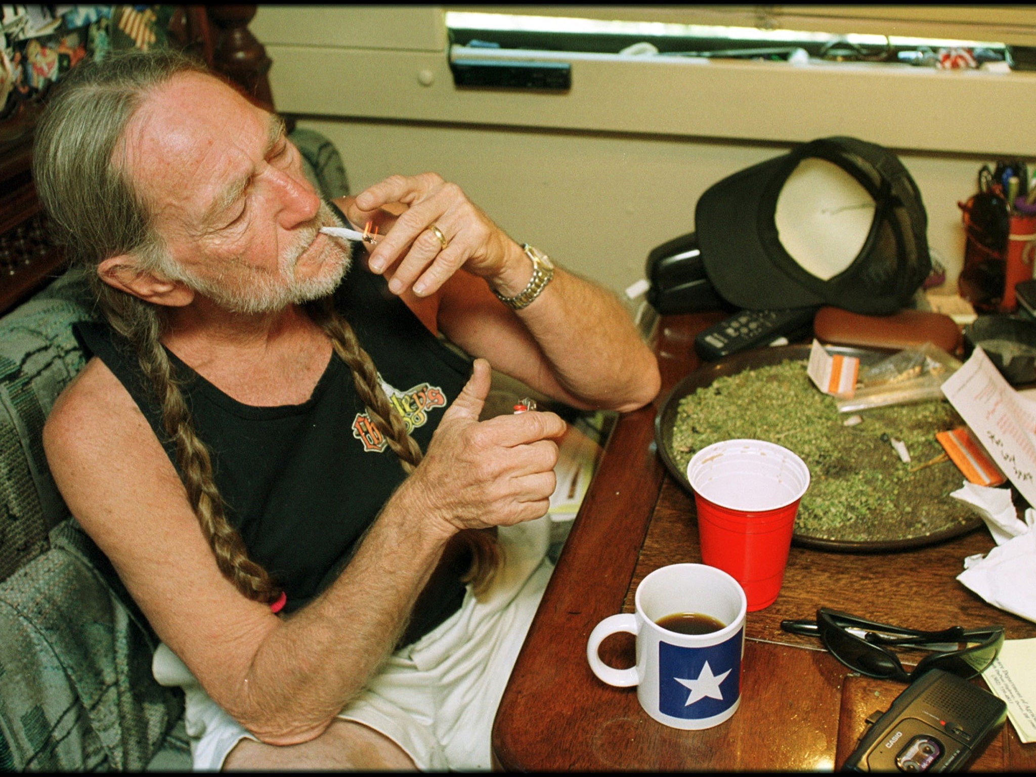 Willie Nelson relaxing at his home in Texas