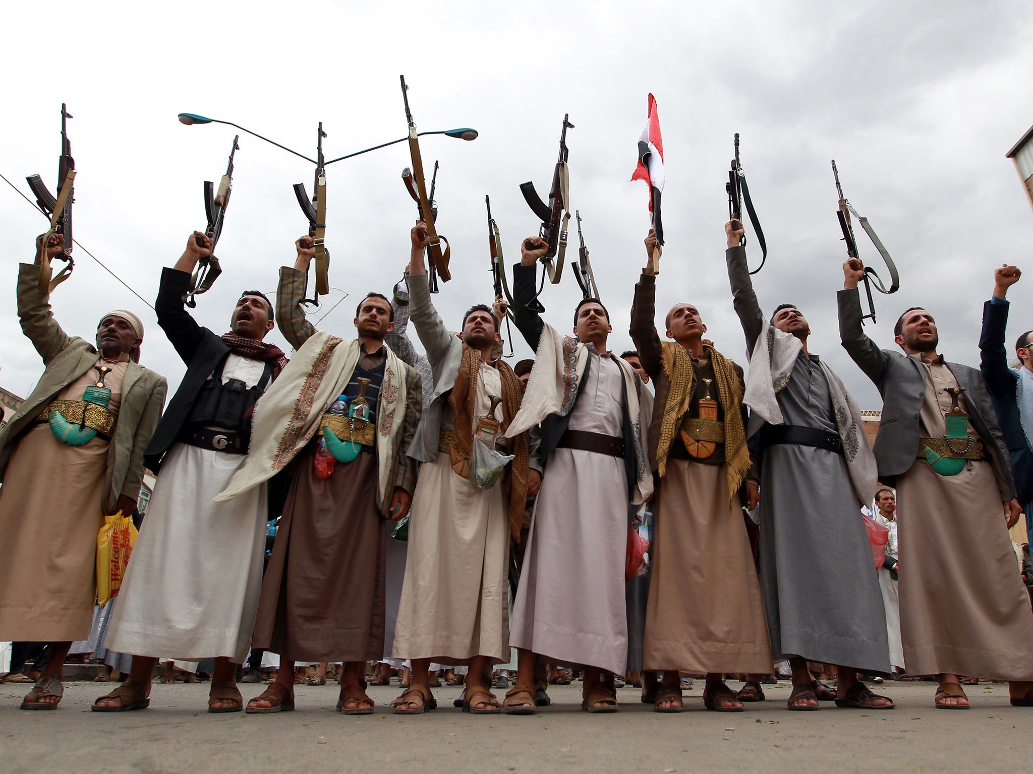 Tribal gunmen in the capital Sanaa show support for the Shia Houthi militia and their opposition to the Saudi-led intervention in Yemen