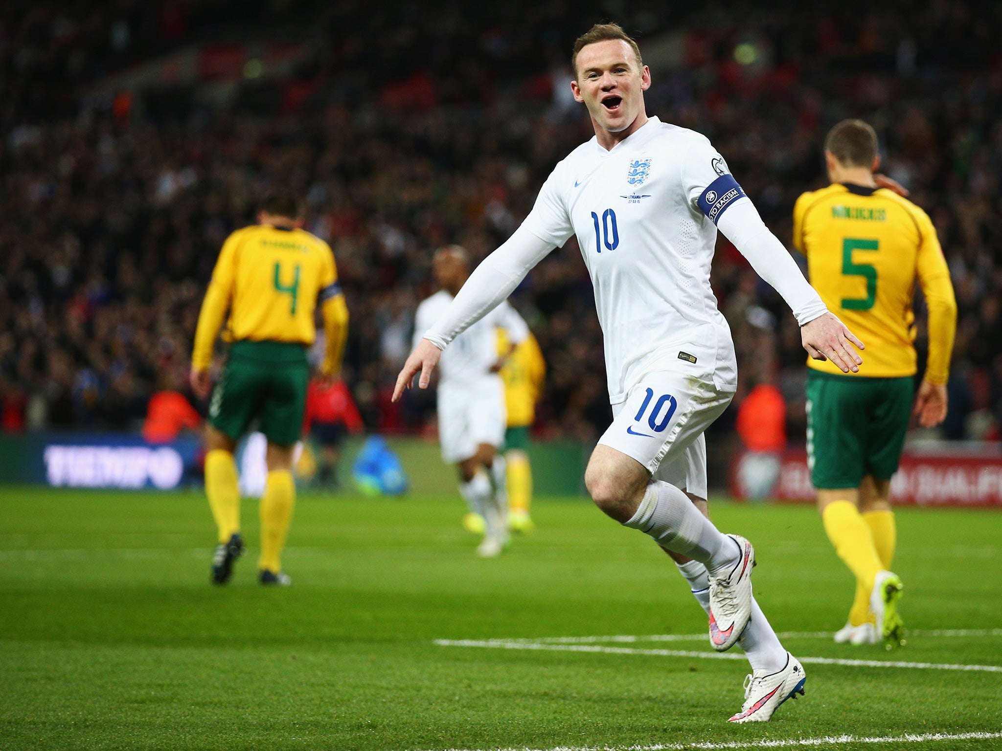 Wayne Rooney celebrates scoring against Lithuania