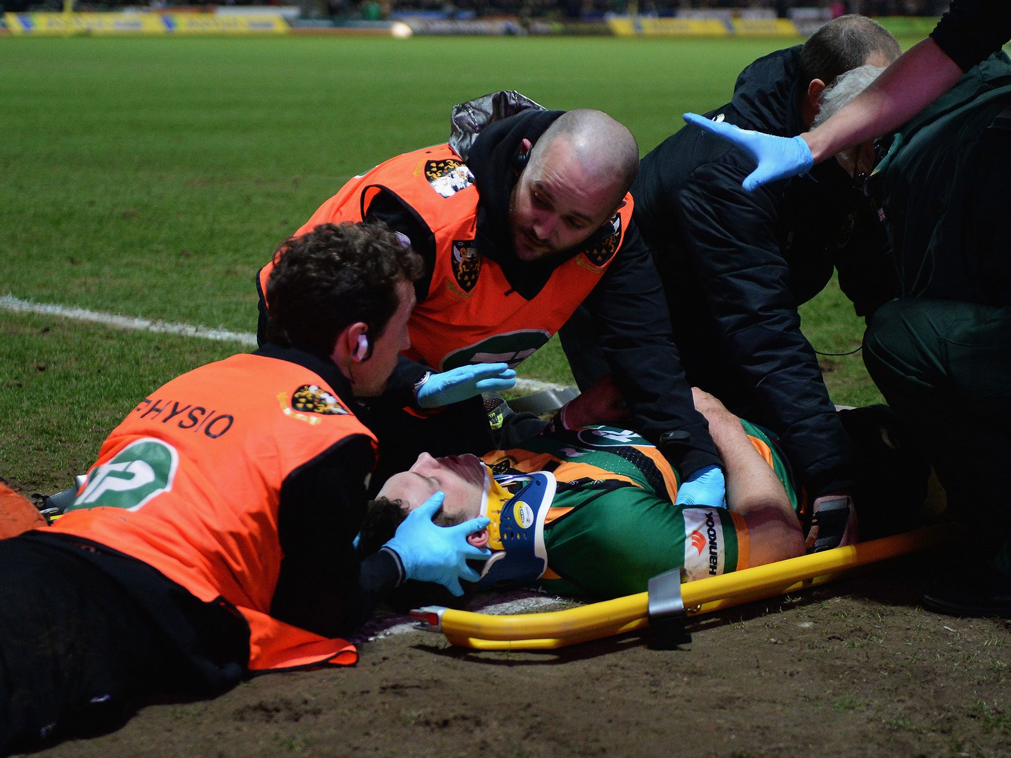 George North receives treatment after a knee to the head getty