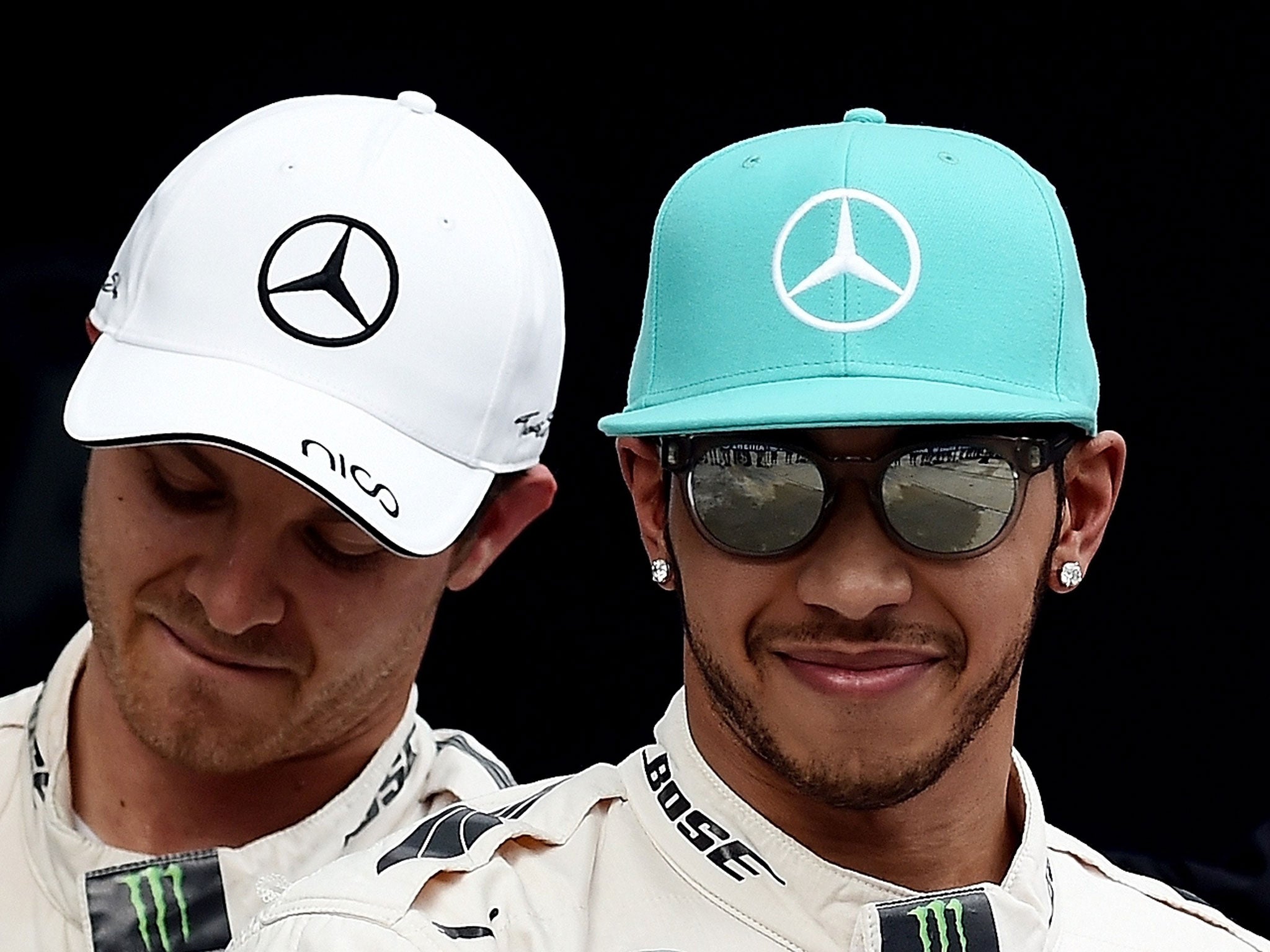 Rosberg grimaces after Hamilton clinches pole