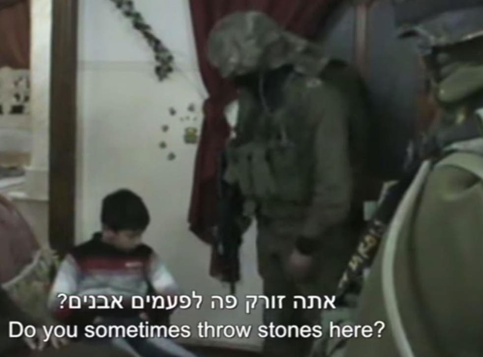 IDF soldiers questioning children at a home in Hebron overnight on 23 February