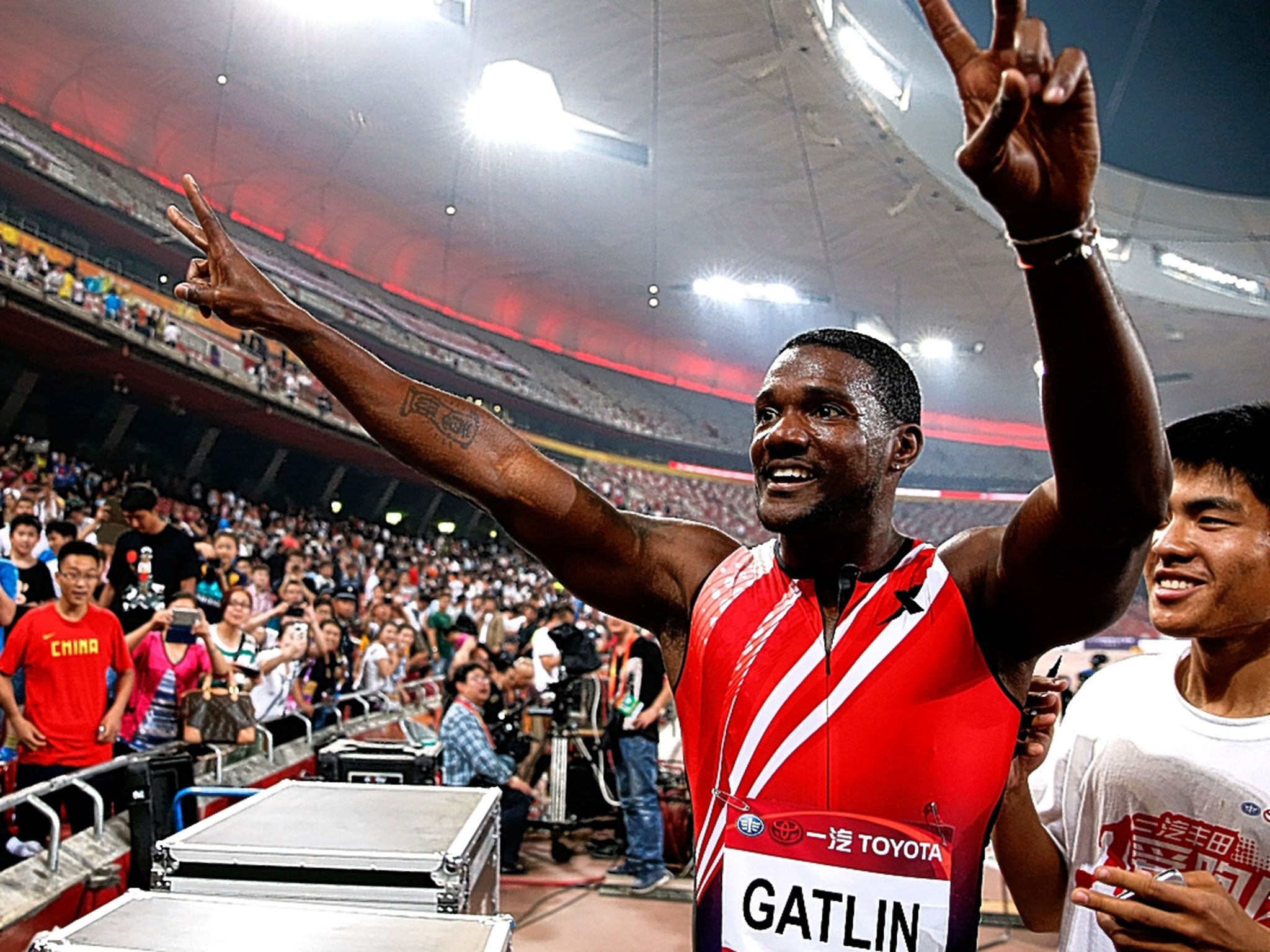 Justin Gatlin revels in his 100m victory at the IAAF World Challenge in Beijing last year