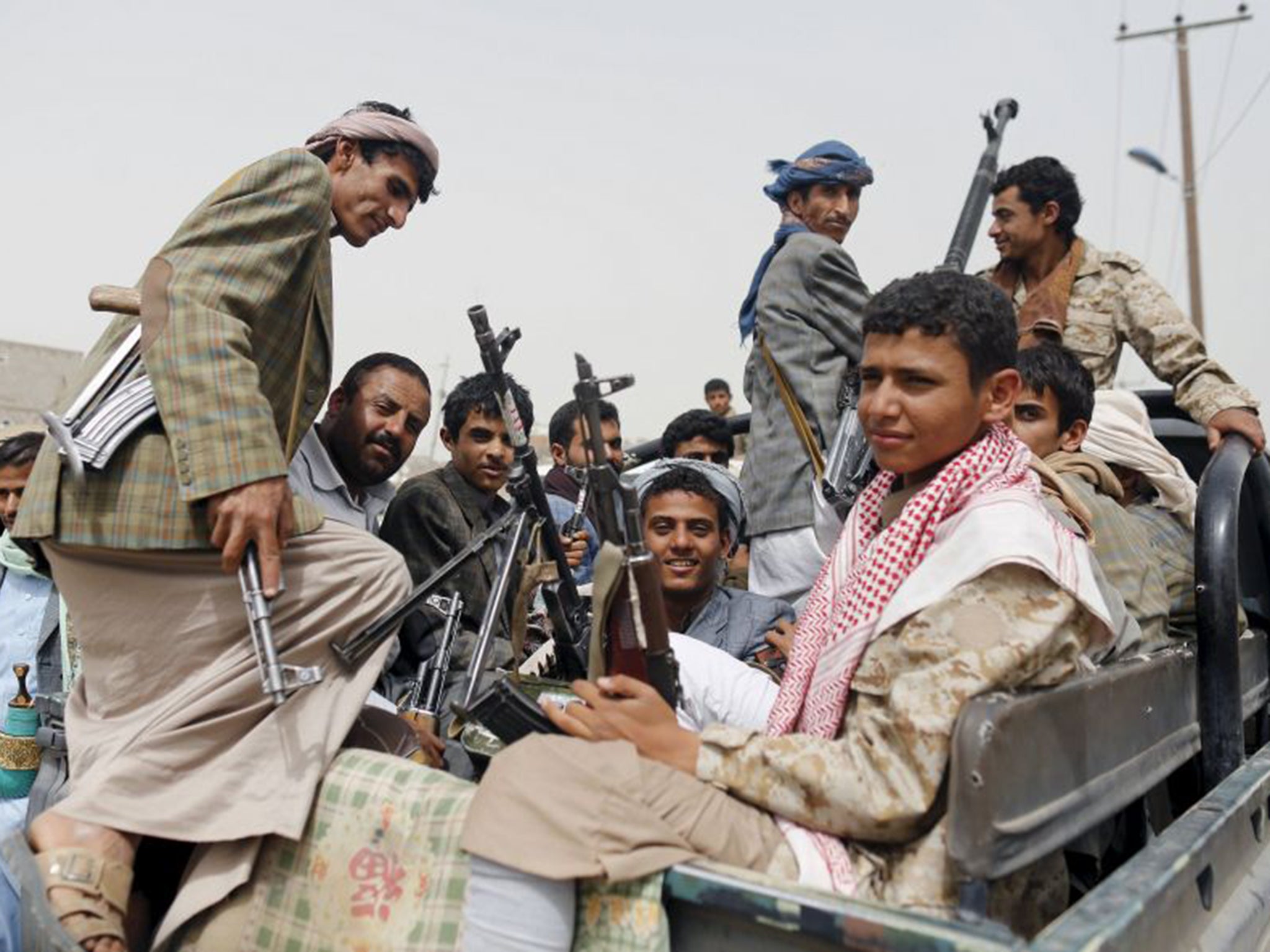 Houthi fighters near Sanaa airport on Saturday