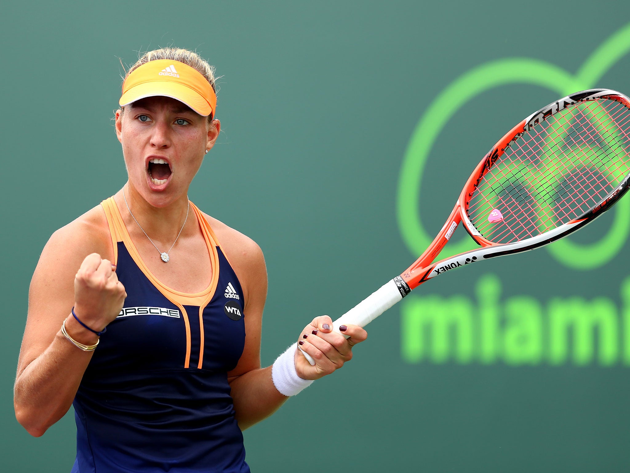 Angelique Kerber celebrates victory over Heather Watson