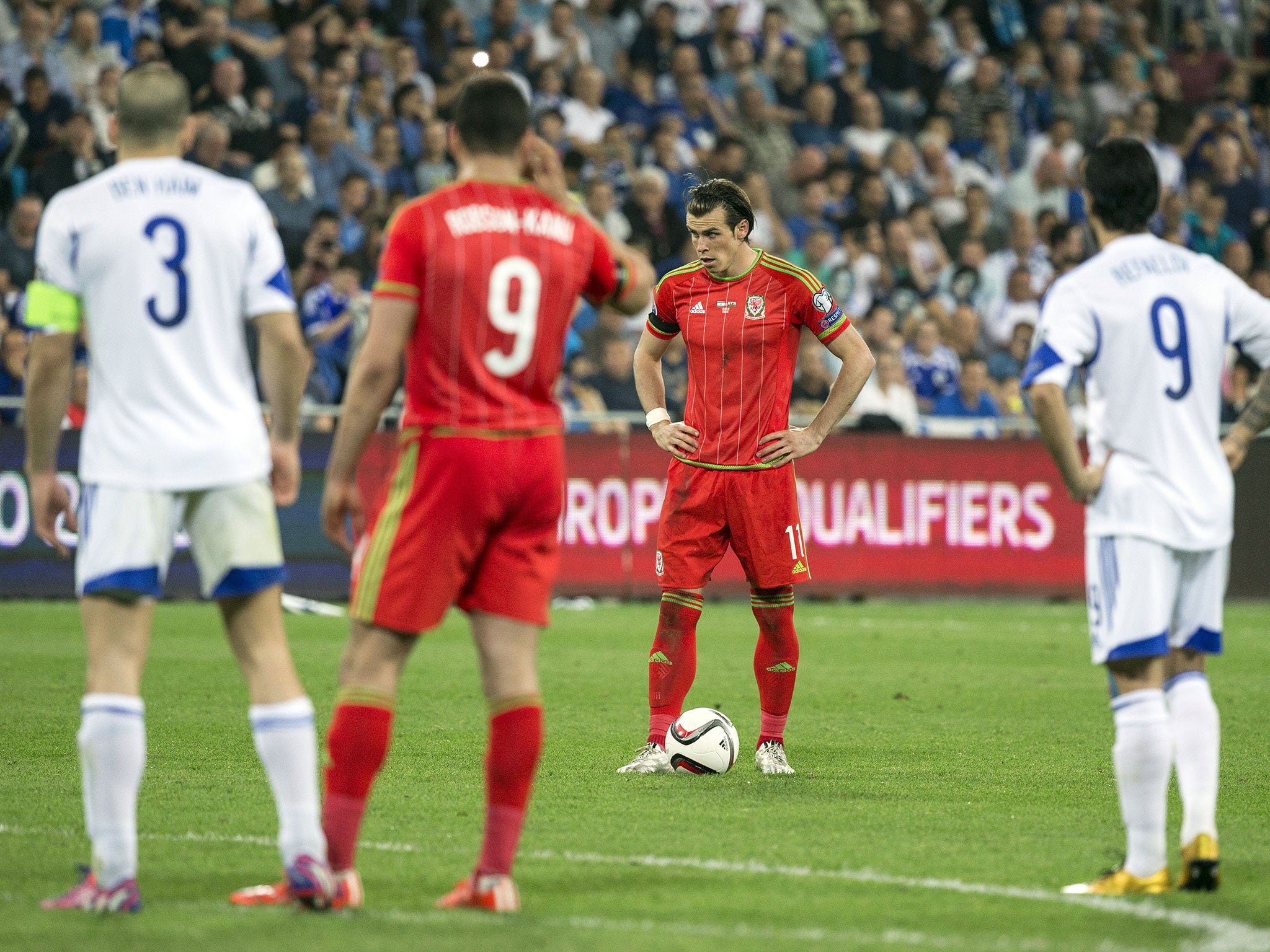 Bale lines up a free-kick before putting Wales 2-0 up against Israel