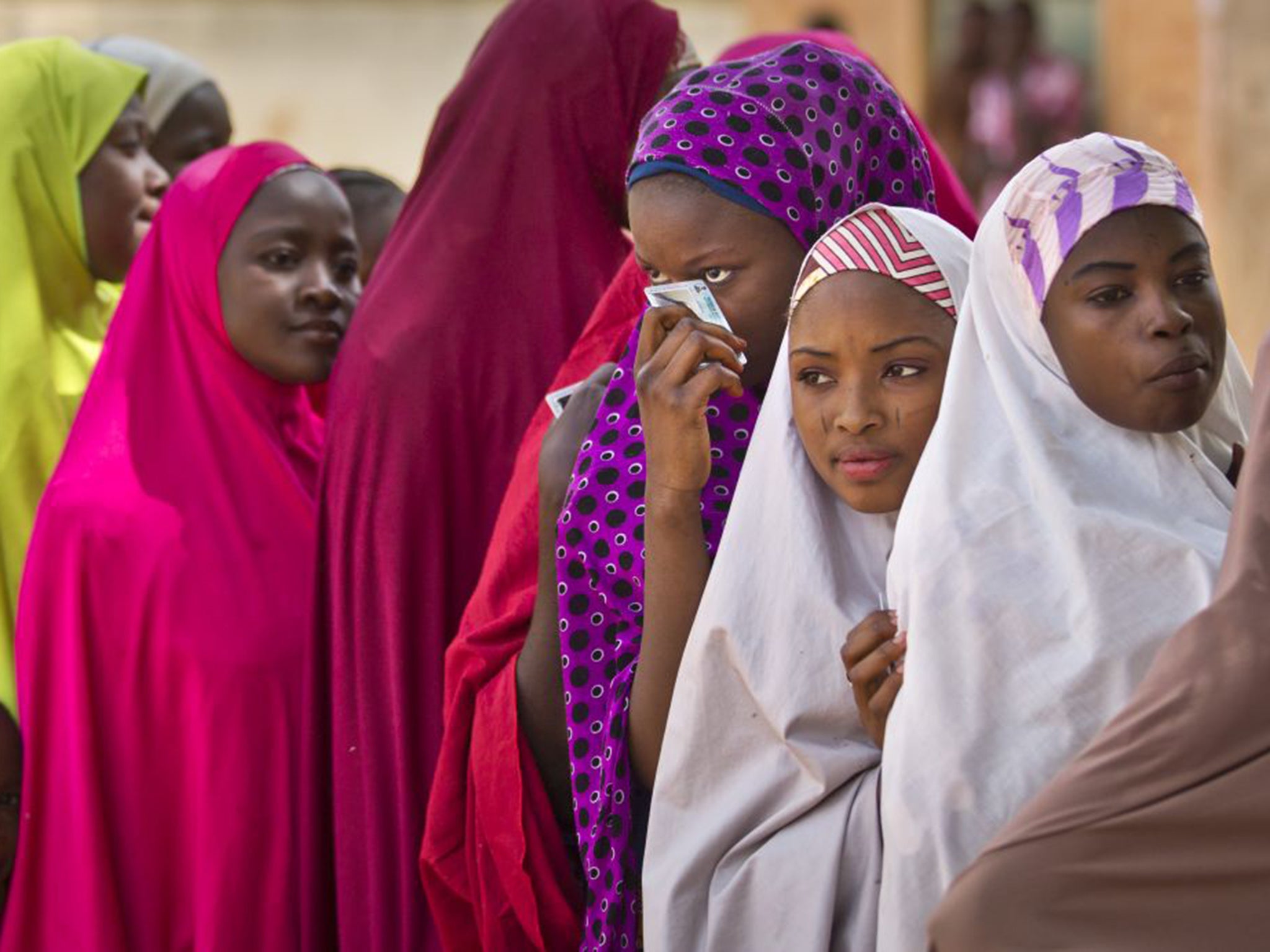 Women cast their vote in Daura, the home town of opposition candidate Muhammadu Buhari