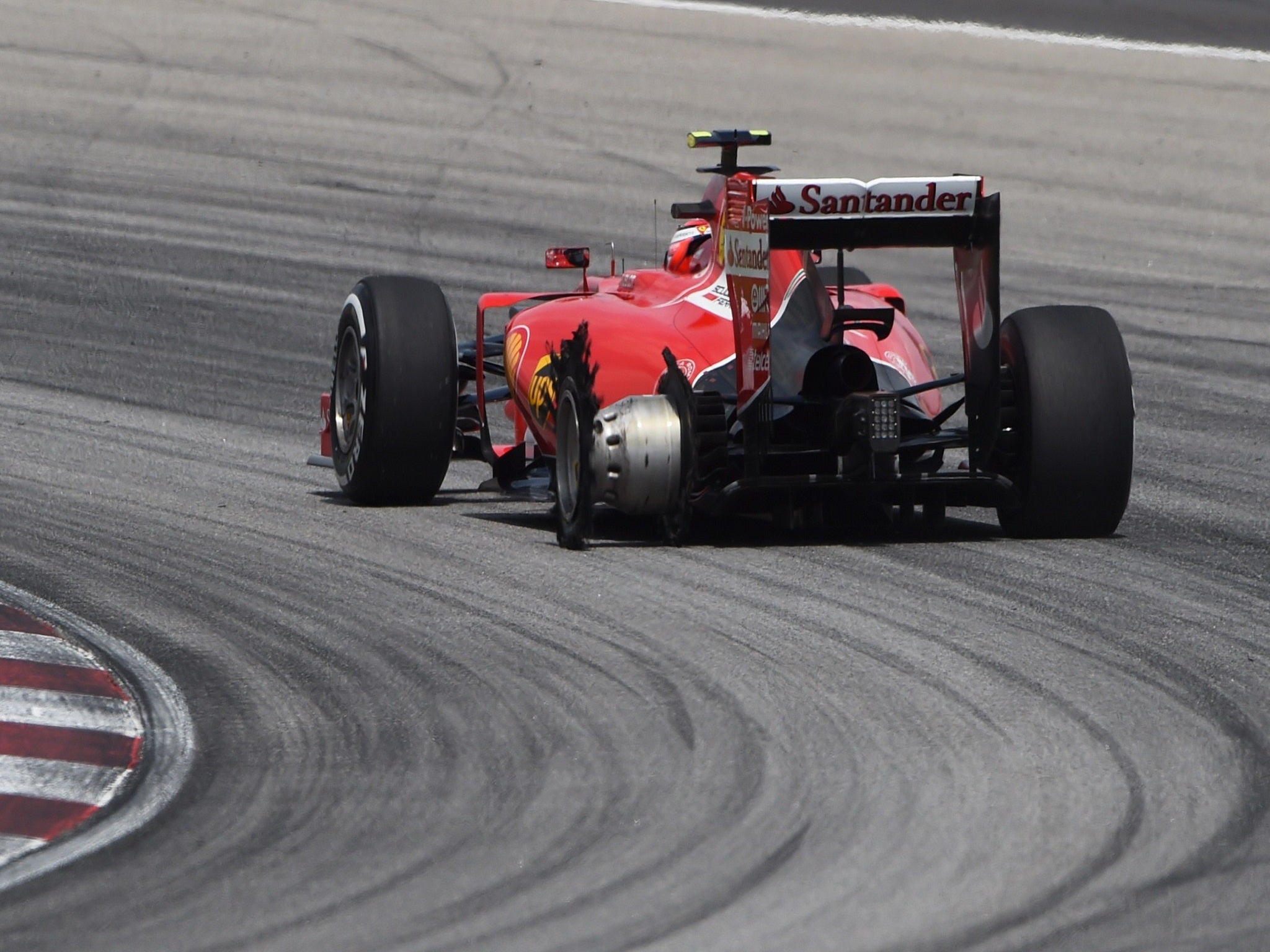 Kimi Raikkonen was hampered by an early puncture