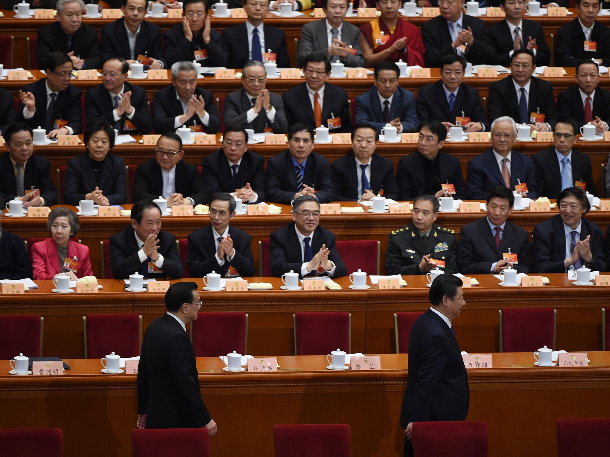 President Xi Jinping, right, and Premier Li Keqiang, left, at the Great Hall of the People earlier this month. President Xi’s top-down anti-corruption campaign has proven popular with the public