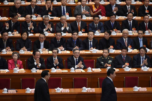 President Xi Jinping, right, and Premier Li Keqiang, left, at the Great Hall of the People earlier this month. President Xi’s top-down anti-corruption campaign has proven popular with the public