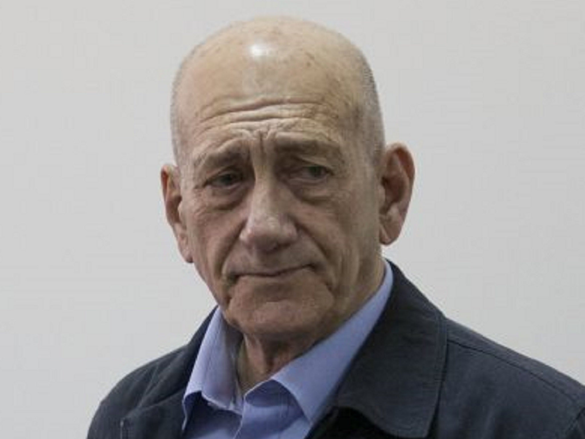 Olmert at court today where he was found guilty on Monday of accepting illegal payments from a US businessman