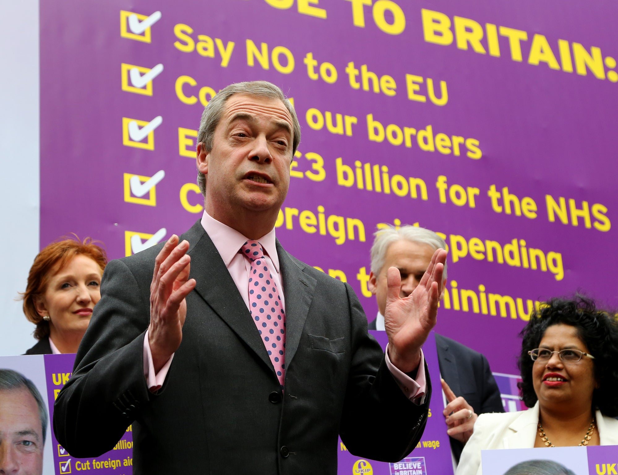 Nigel Farage unveils Ukip's five-point pledge card (PA)