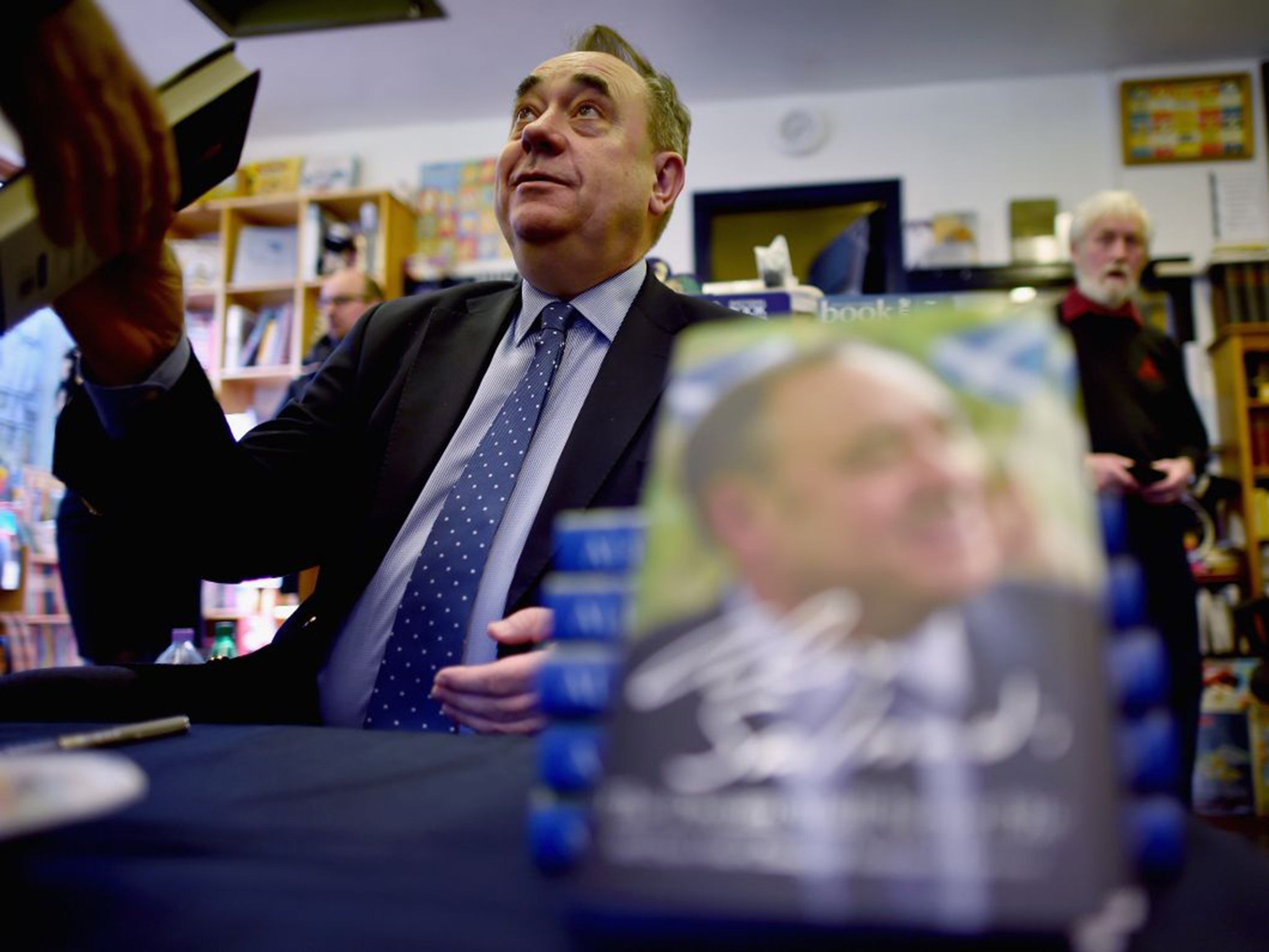 Alex Salmond signed books during the first day of the Election campaign in Ellon, Scotland