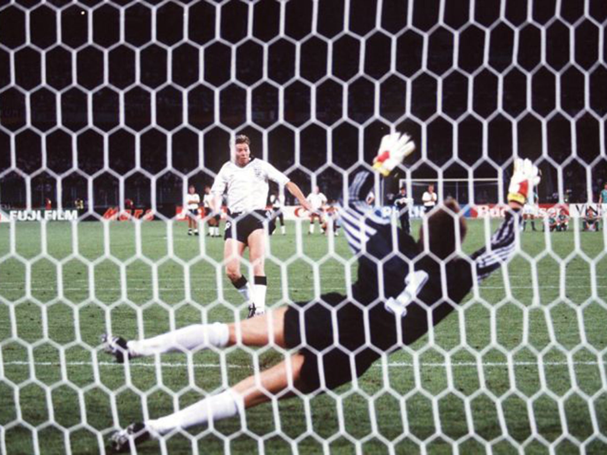 Chris Waddle sends his penalty over the bar in Turin