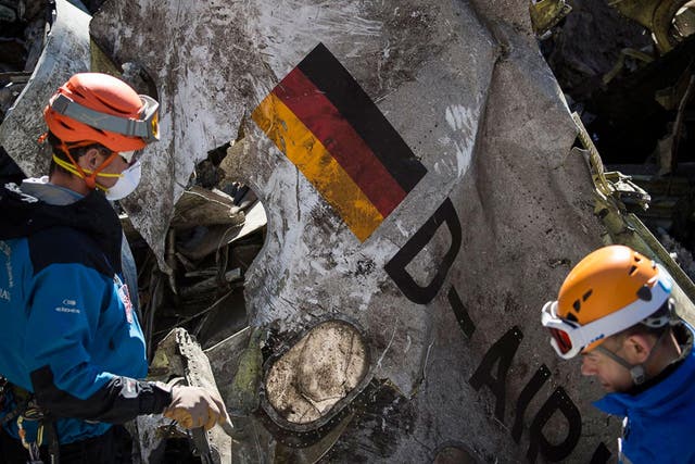 Investigators pick through the wreckage of the Germanwings air crash in March 2015. The co-pilot, who had been treated for depression, deliberately flew the plane into a mountain