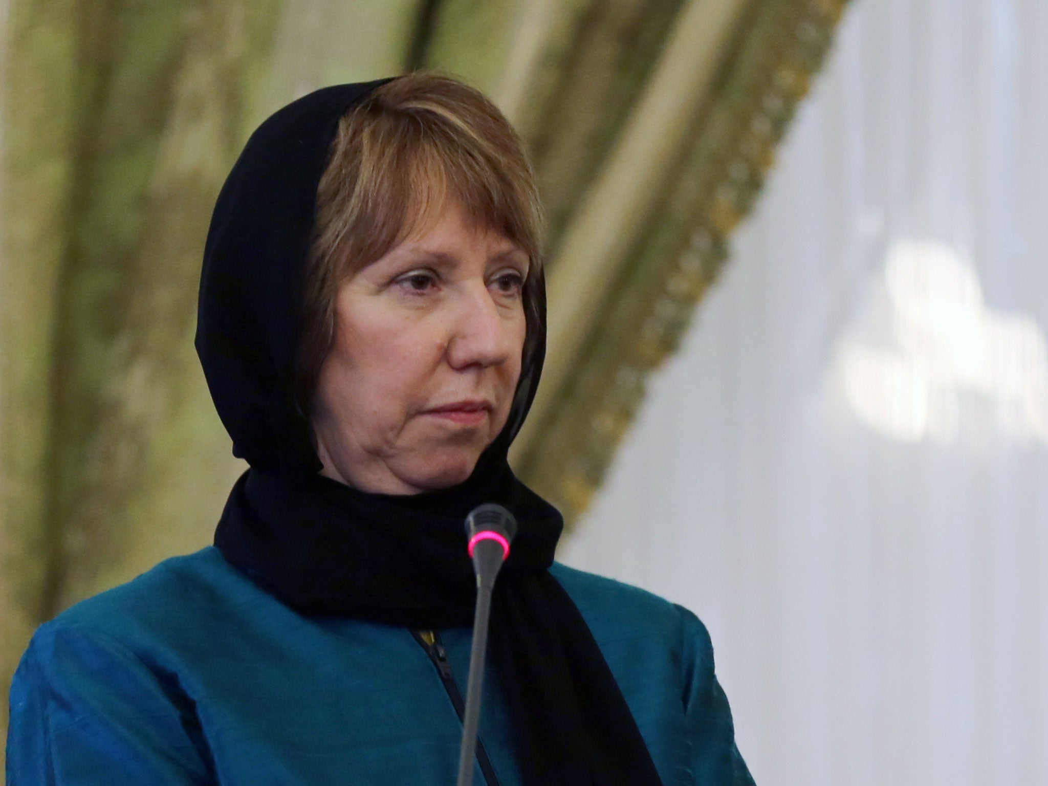 Catherine Ashton listens during a joint press conference with Iranian Foreign Minister Mohammad Javad Zarif in Tehran (AFP/Getty)