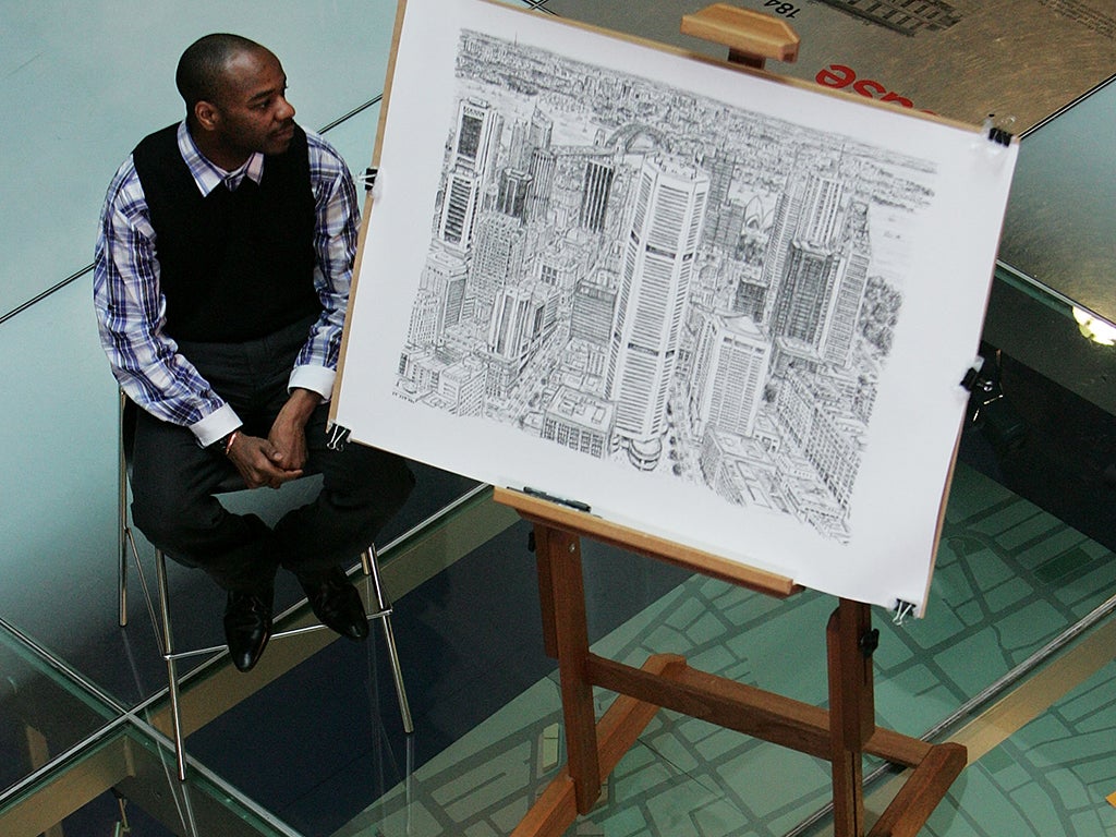 British artist Stephen Wiltshire sits with his detailed sketch of the Sydney cityscape during a press conference at Customs House on April 30, 2010 in Sydney, Australia. Diagnosed with autism at the age of three, 36-year-old Wiltshire has the ability to d