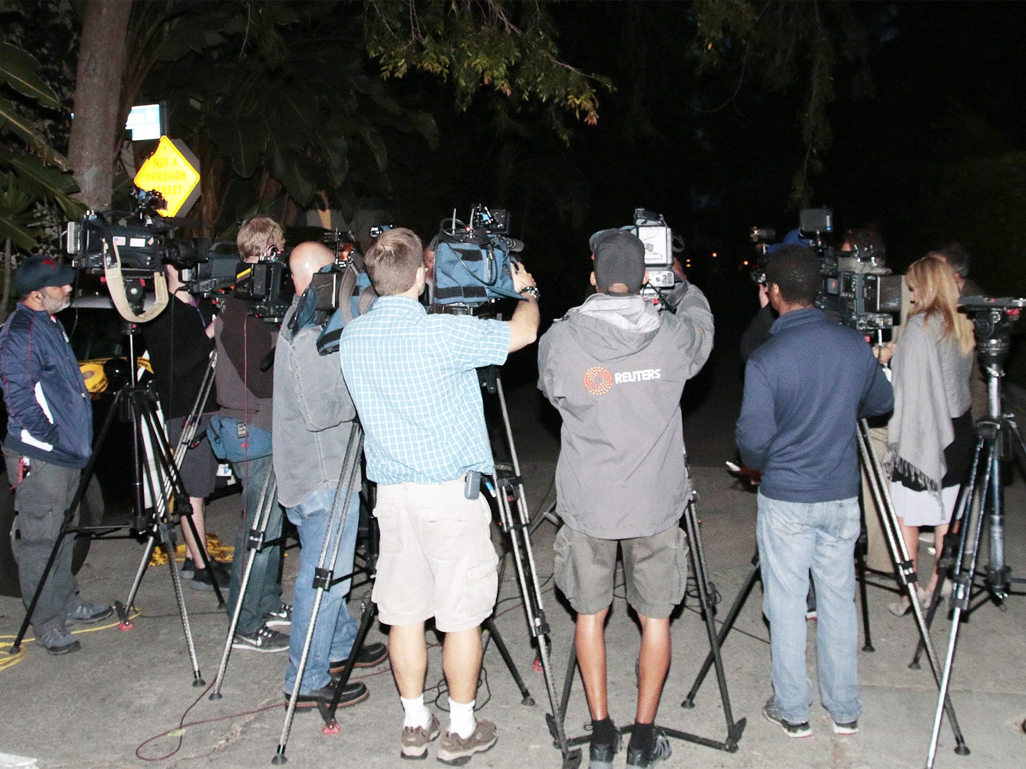 Media gathered outside Andrew Getty's Hollywood home