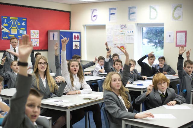 Hands up for non-selective education: pupils at Knole Academy in Sevenoaks, the town’s only secondary school until a Christian free school opened 18 months ago 